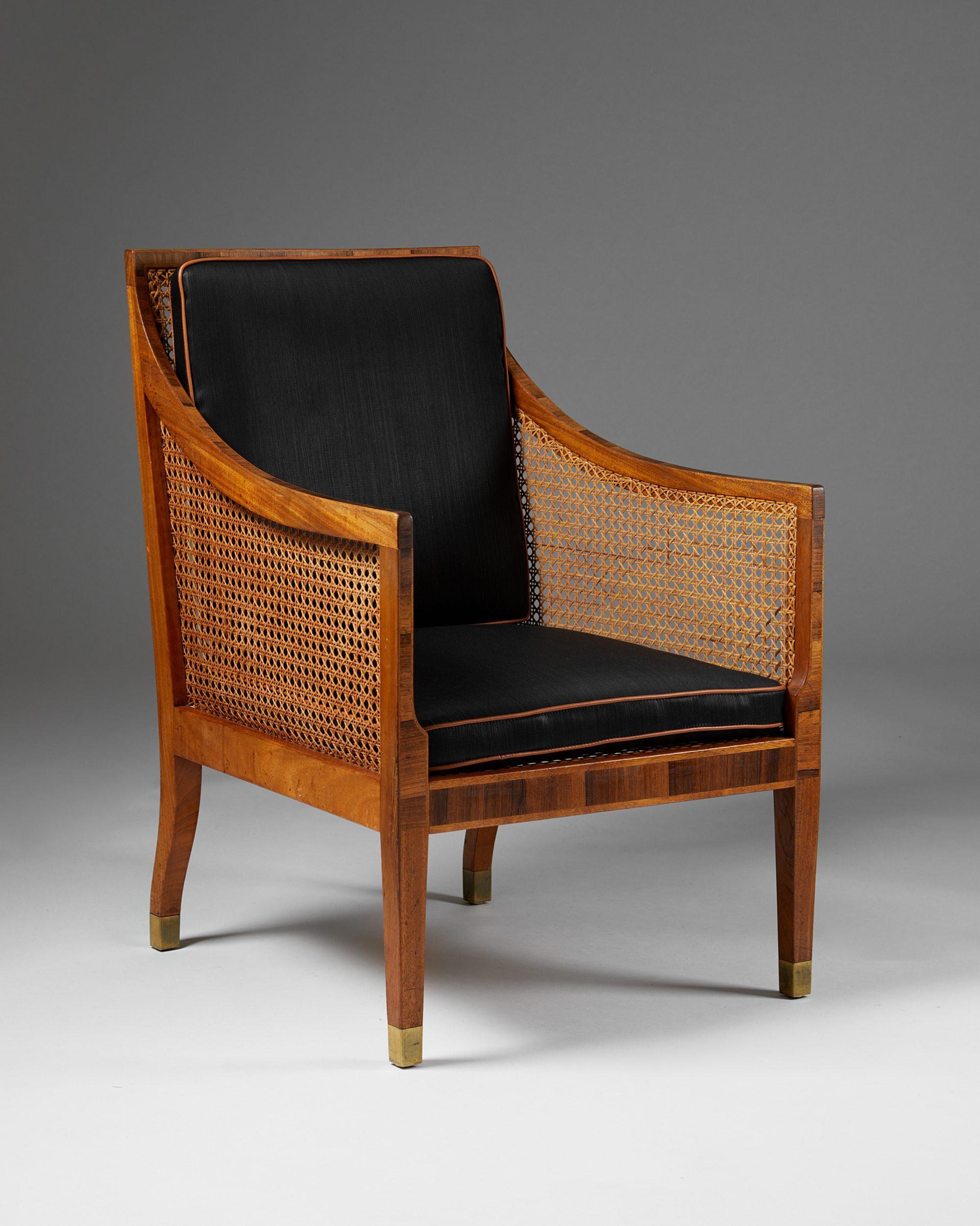 Armchair model 4488 designed by Kaare Klint for Rud. Rasmussen,
Denmark, 1931.

Mahogany with walnut inlays, woven cane, black horsehair upholstery, and cognac leather piping.

Exquisite woodwork and canework make this piece by the Danish