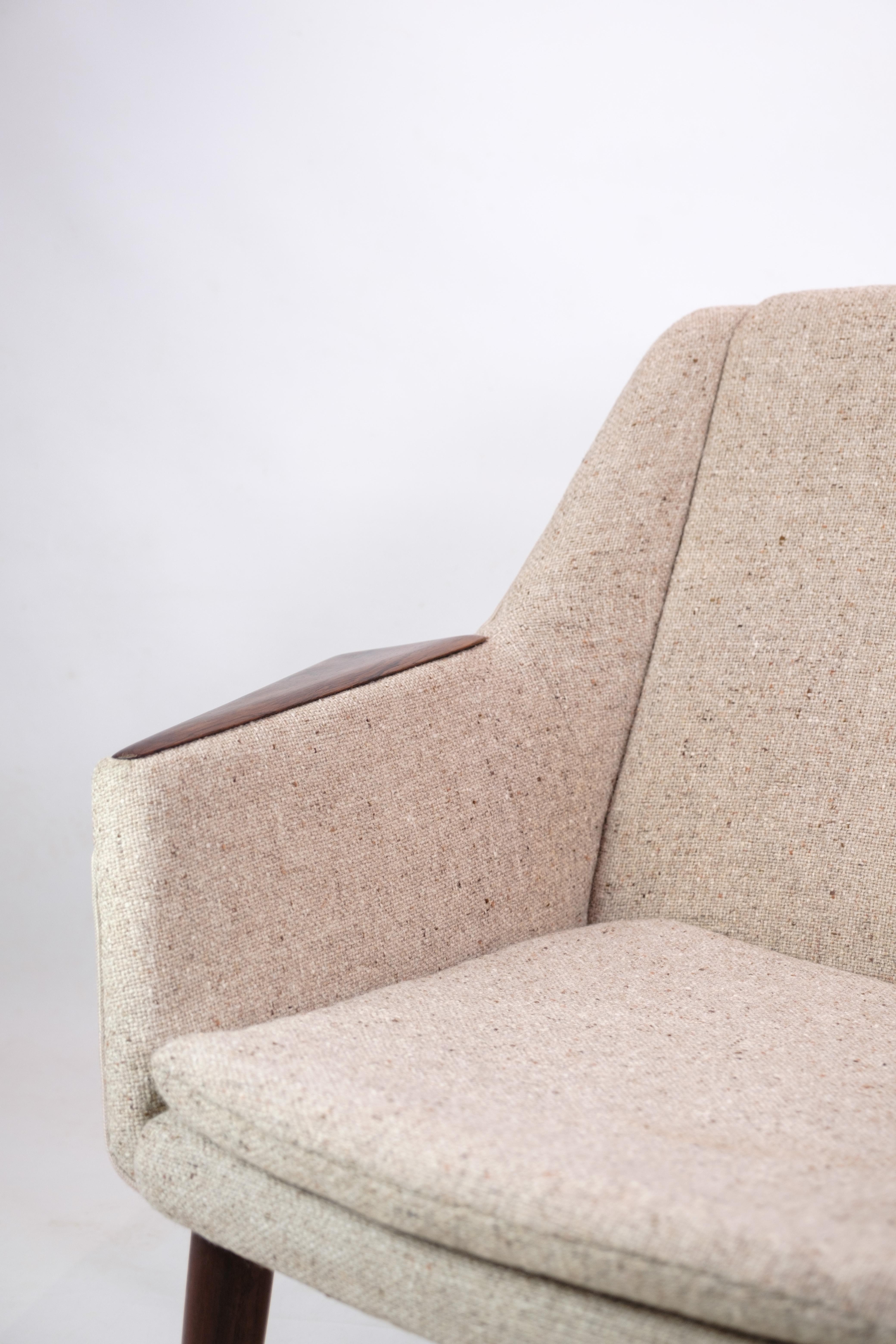 An armchair of Model 813, designed by Arne Vodder & Anton Berg and manufactured by Slagelse Møbelfabrik in Denmark in the 1960s.
This elegant armchair is a masterful example of Danish furniture design from the mid-20th century. It combines the best