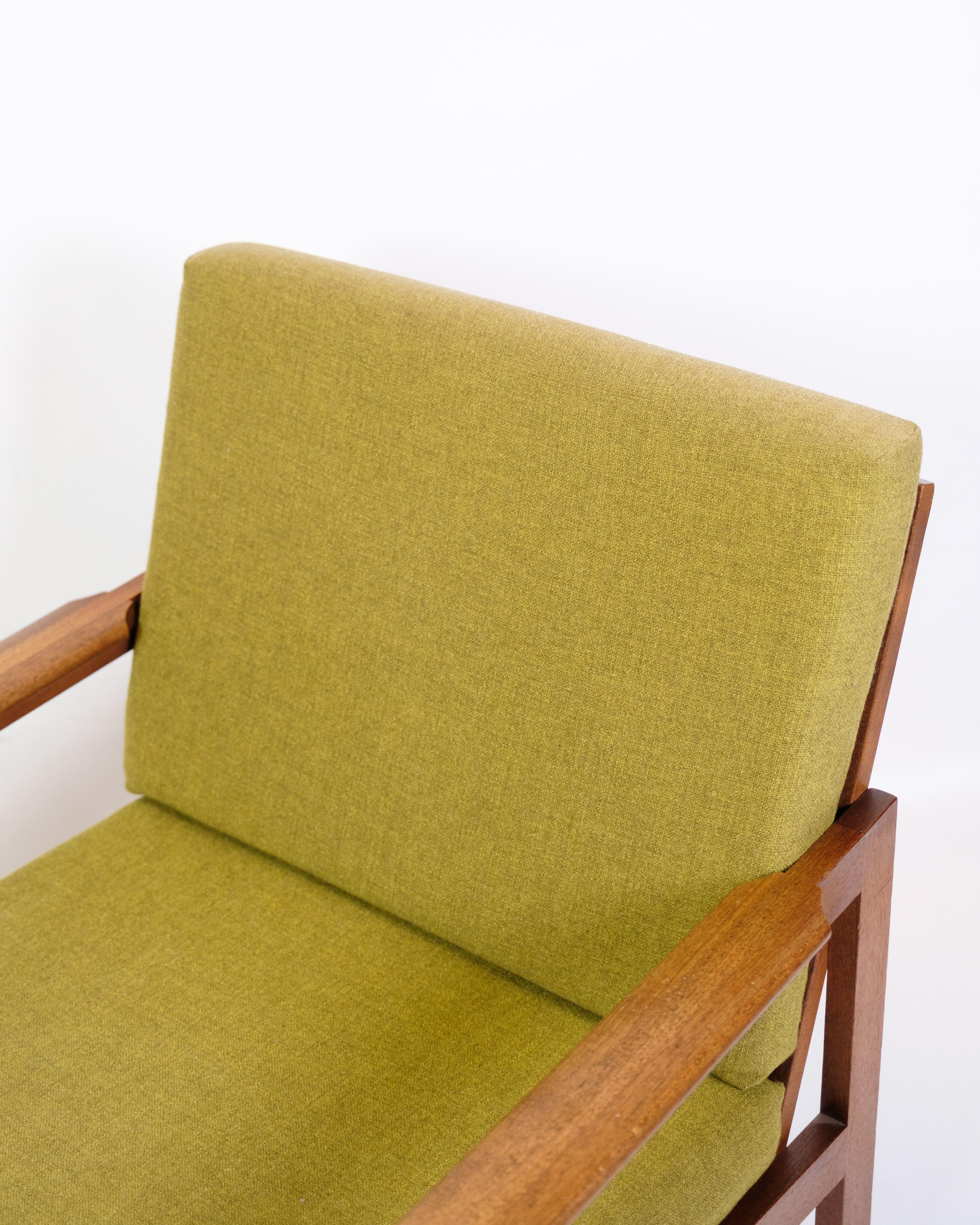 Capella armchair made of teak with cushions upholstered in green fabric. Designed by Illum Wikkelsø and manufactured by N.Eilersen from the 1960s.

Designed by Illum Wikkelsø, who is known for his functional approach to furniture design, Model