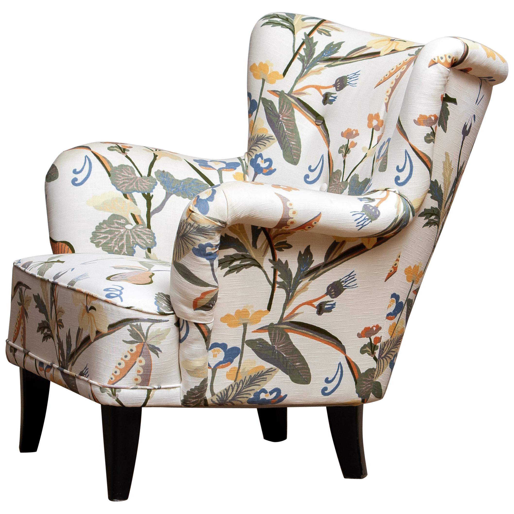 Extremely beautiful 1940s-1950s Arm / lounge / club chair upholstered (in a later period) with the typical floral print fabric designed by Josef Frank.
This chair is designed by Ilmari Lappalainen for Asko Finland. 