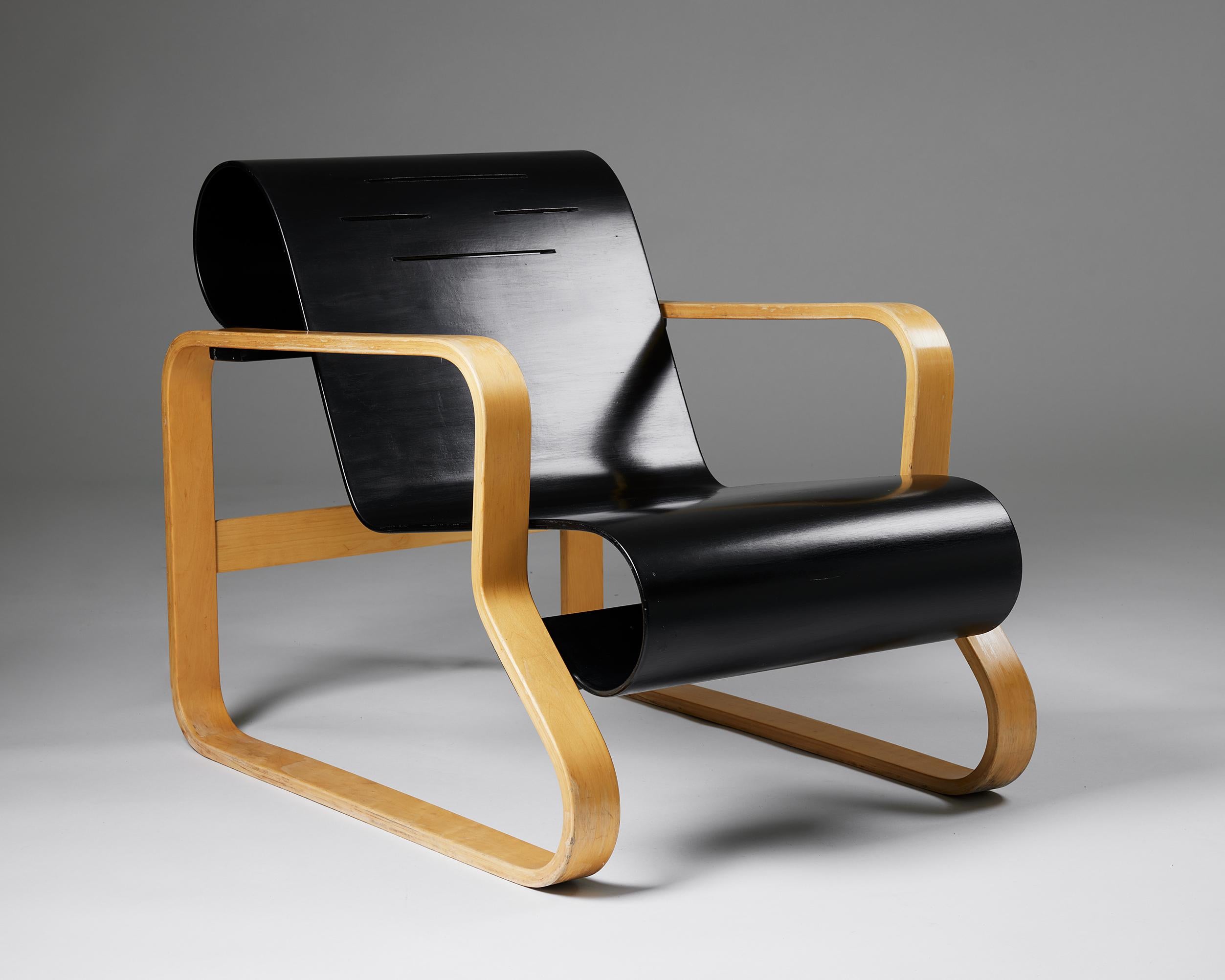 Armchair ‘Paimio 41’ designed by Alvar Aalto for OY Huonekalu-ja Rakennustyötehdas,
Finland, 1960s.

Lacquered birch and bent plywood.

Originally created for the interior of a tuberculosis sanatorium in the Finnish city of Paimio, this is