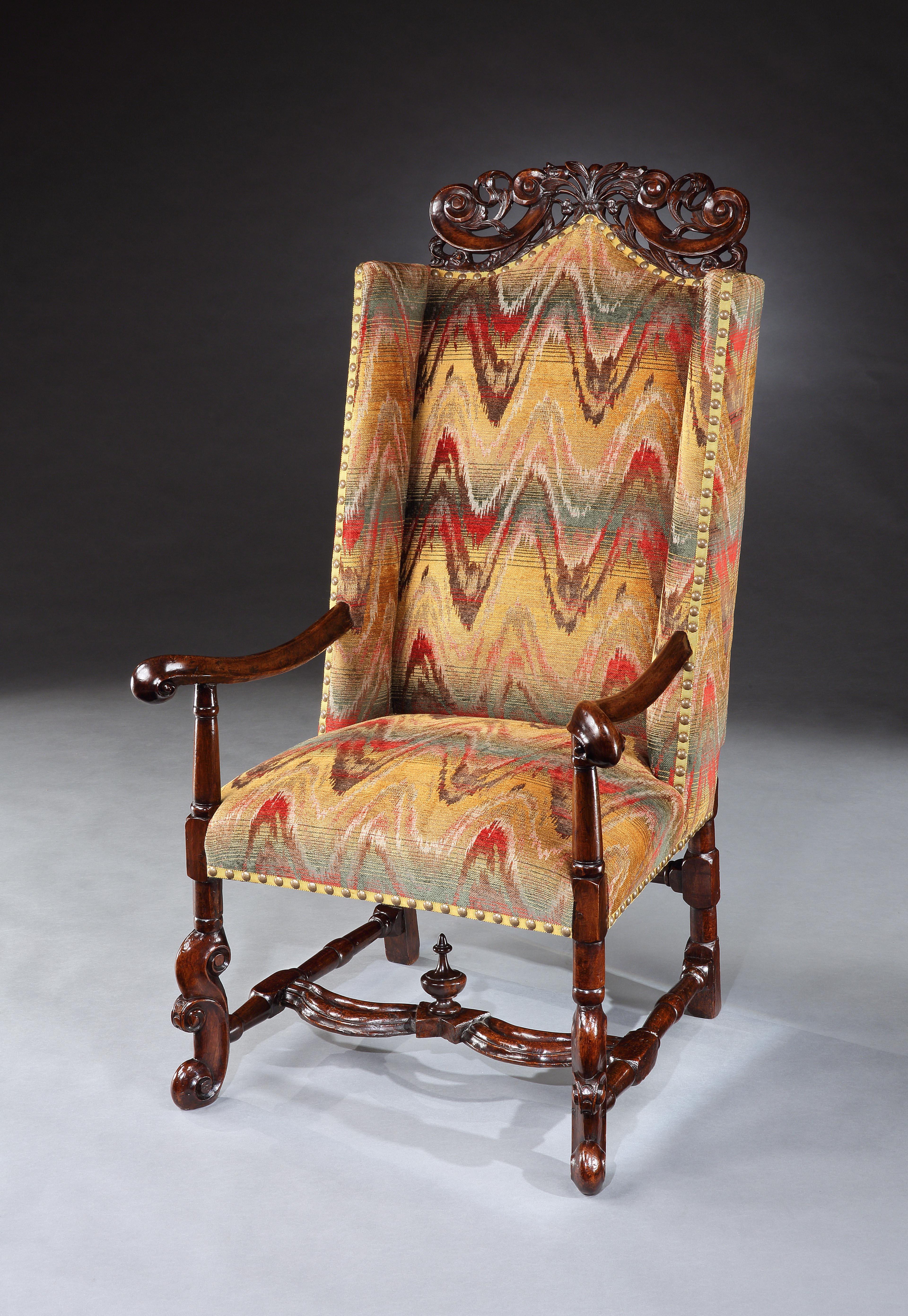 A museum quality, late-17th century, walnut, upholstered sleeping armchair

•	Exceptionally rare model; one of the first models of upholstered armchair with the addition of the wings intended to conceal draughts. 
•	Transitional form : many of the