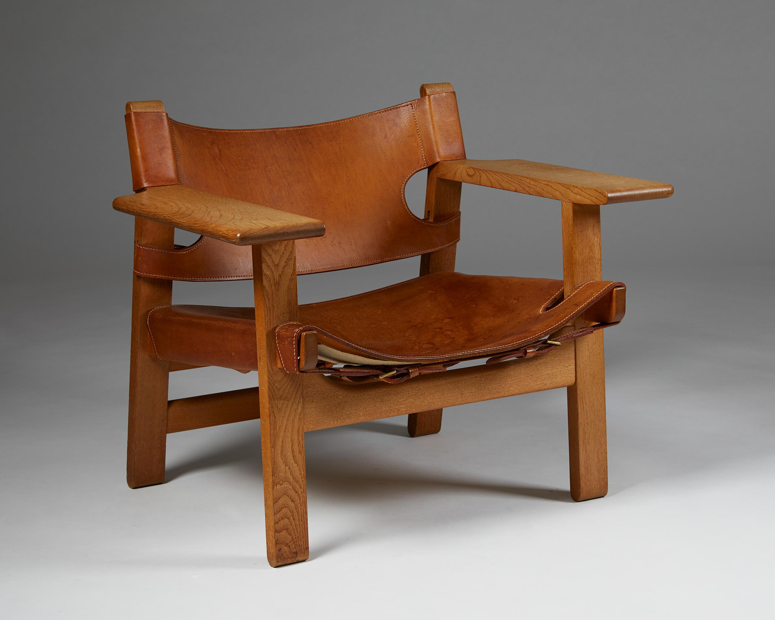 Oak and leather. 

Stamped.

The robust construction, simple lines, and natural materials of Børge Mogensen’s “Spanish Chair” make it one of the most significant 20th-century Danish design collectables. Mogensen designed the piece after a trip to