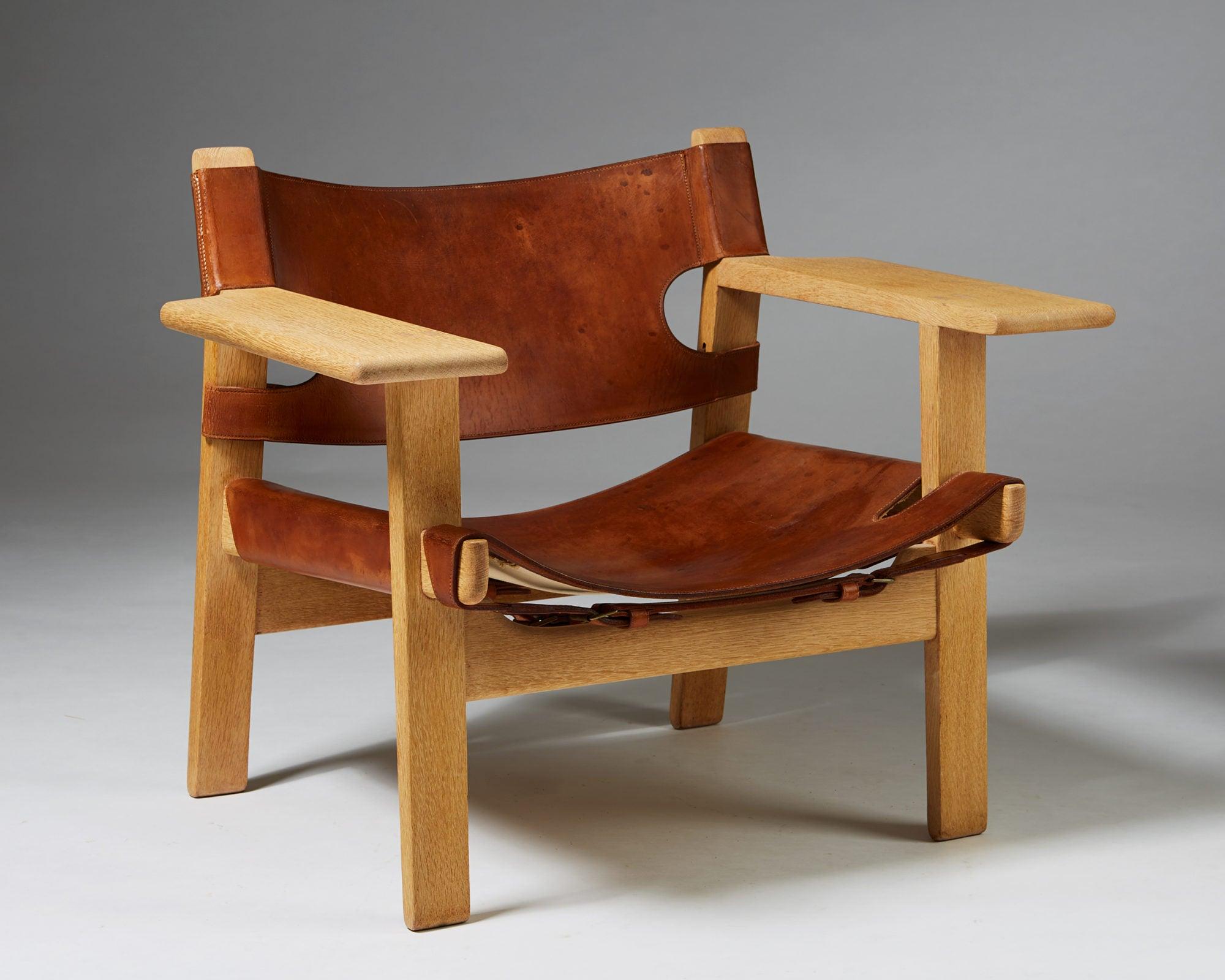 Armchair “Spanish” designed by Børge Mogensen for Erhard Rasmussen, Denmark, 1958.

Oak and leather.

Provenance: This chair is one of the three designed for the Copenhagen cabinet Maker's Guild Exhibition of 1958.

Literature: Dansk Møbelkunst