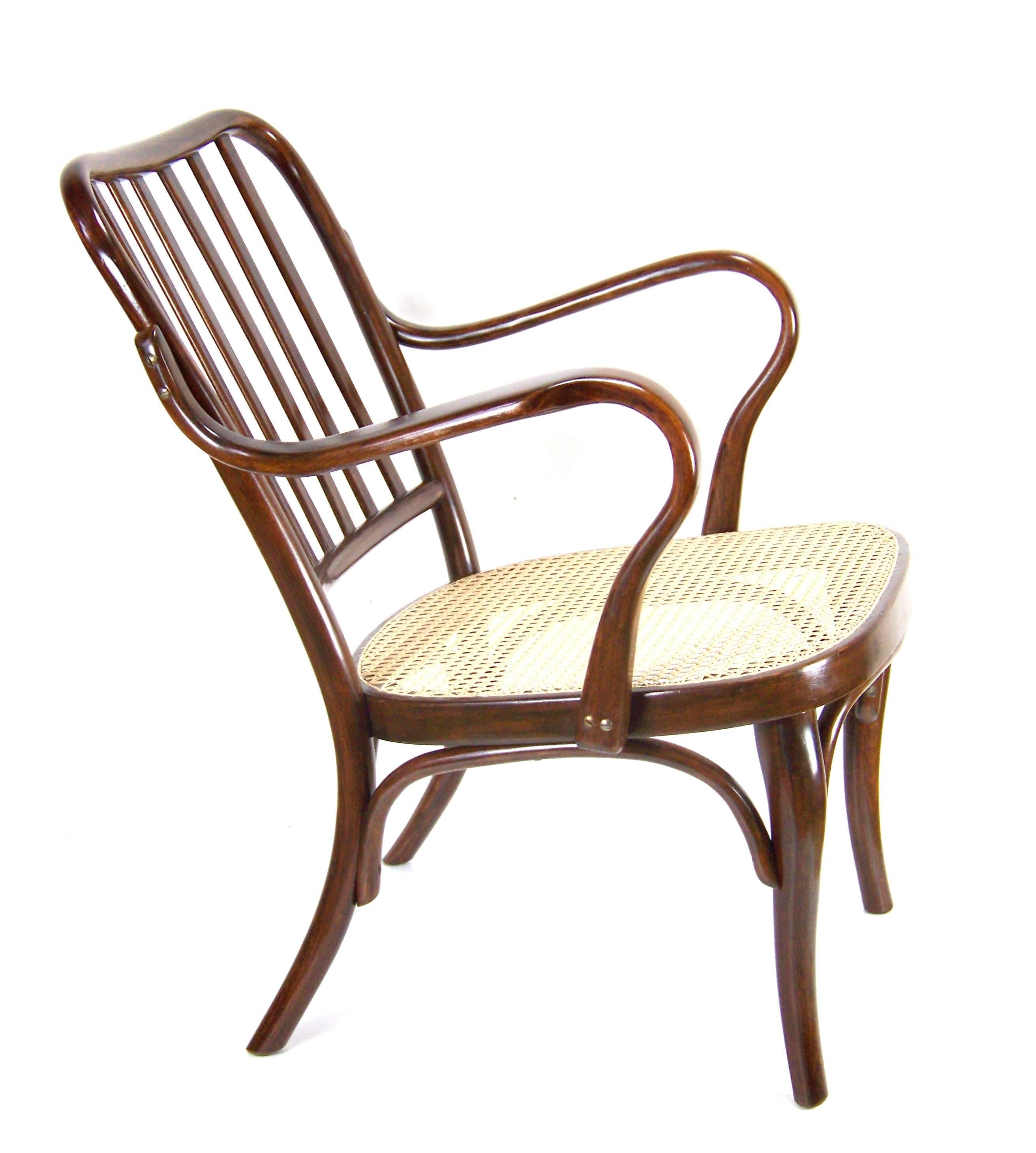 Designed by Frank Josef in year 1933. Manufactured in Czechoslovakia by the Thonet-Mundus company. Marked with stamp THONET. Armchair was cleaned and gentle re-polished with shellack finish. New cannung in seat.