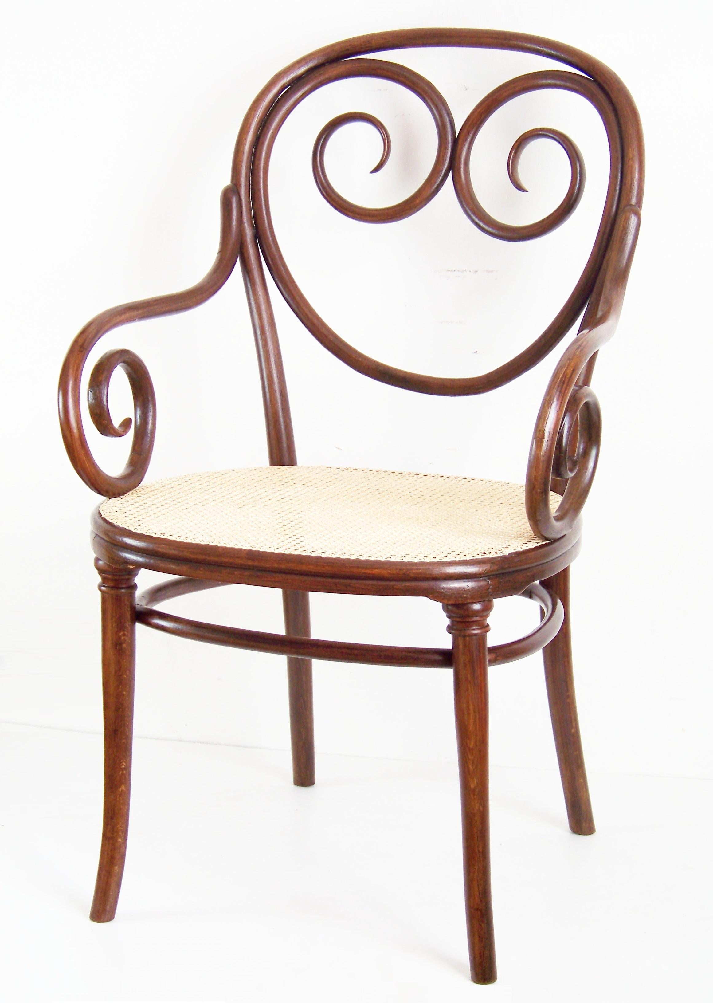 Manufactured in Austria by the Gebrüder Thonet Company. Marked with paper label and stamp 