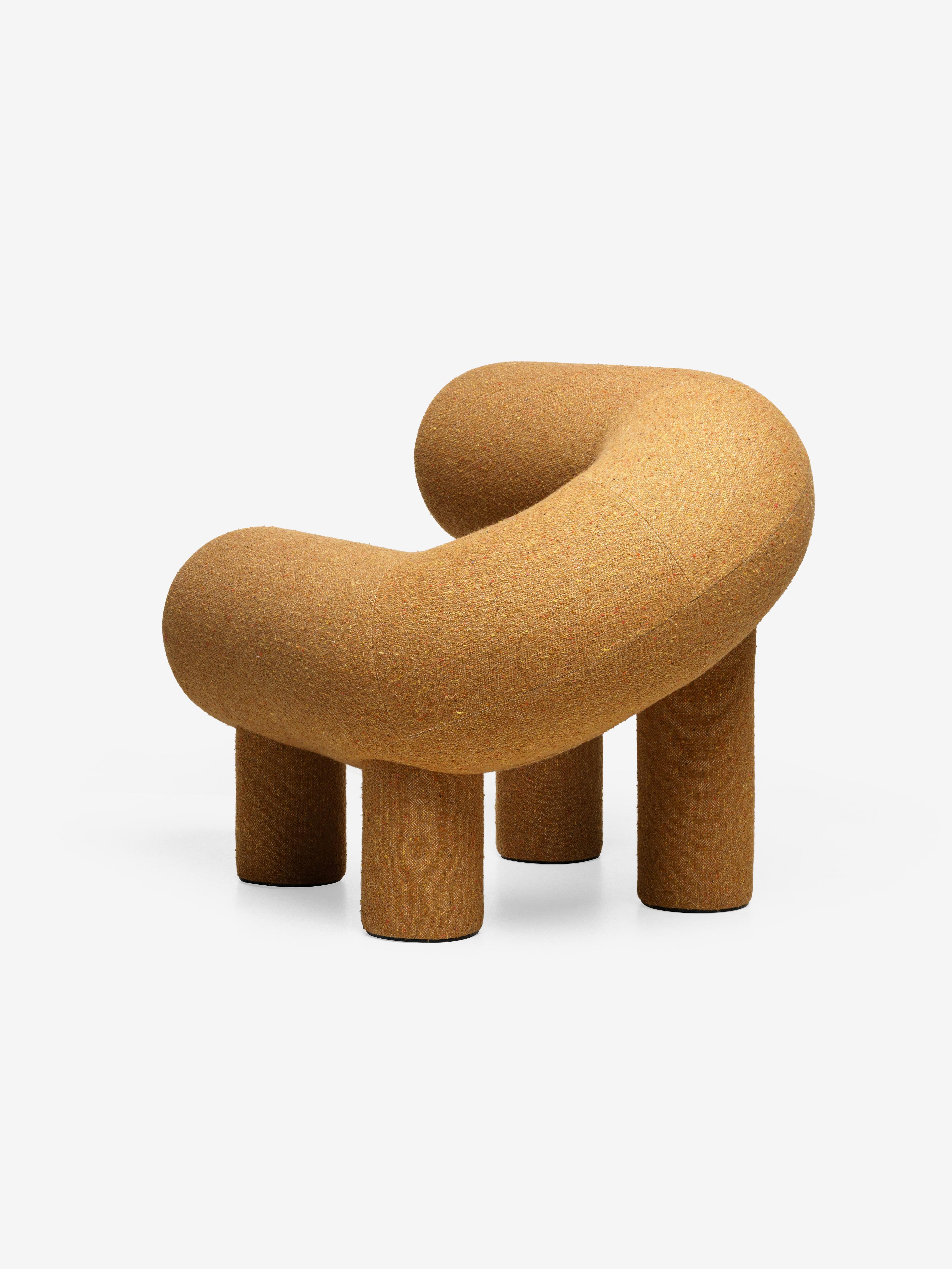 Designer Rostislav Sorokoviy aimed to create an object that resembles a soft sculpture rather than a piece of furniture. 
The seat and back of the armchair consist of two cylinders joined in a horseshoe shape. The legs are also cylindrical, and the