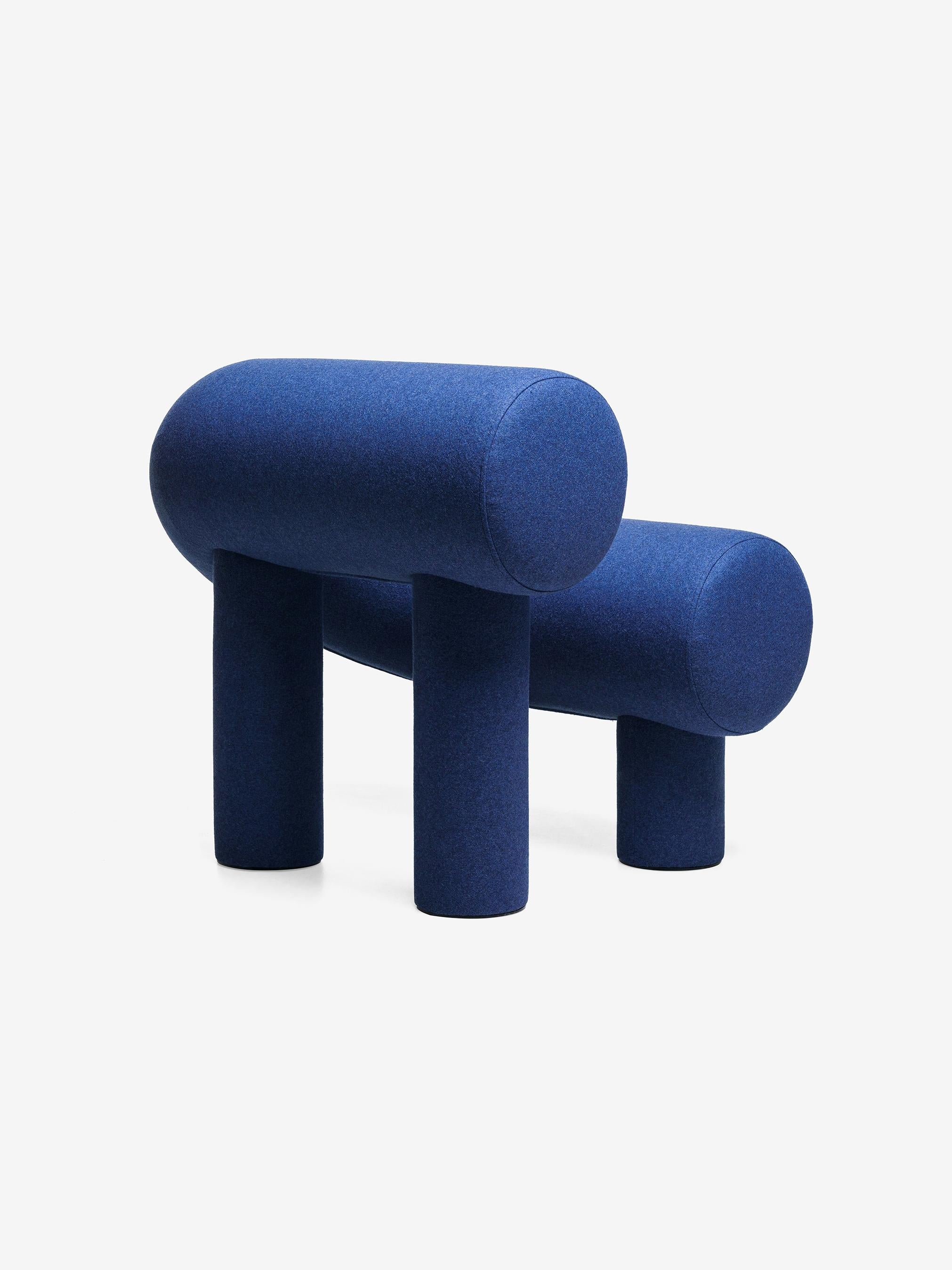 Designer Rostislav Sorokoviy aimed to create an object that resembles a soft sculpture rather than a piece of furniture. 
The seat and back of the armchair consist of two cylinders joined in a horseshoe shape. The legs are also cylindrical, and the