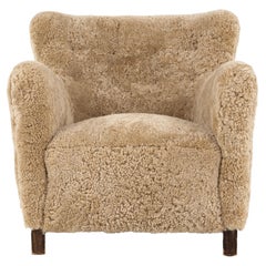Danish easy chair in new lambskin, 1940's