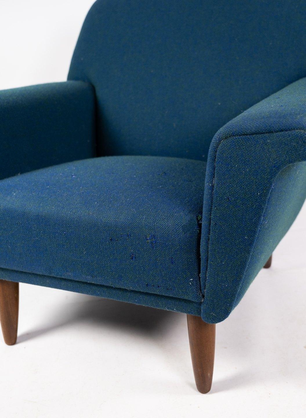Danish Armchair Upholstered with Dark Blue Wool Fabric and Legs in Dark Wood, 1960s For Sale