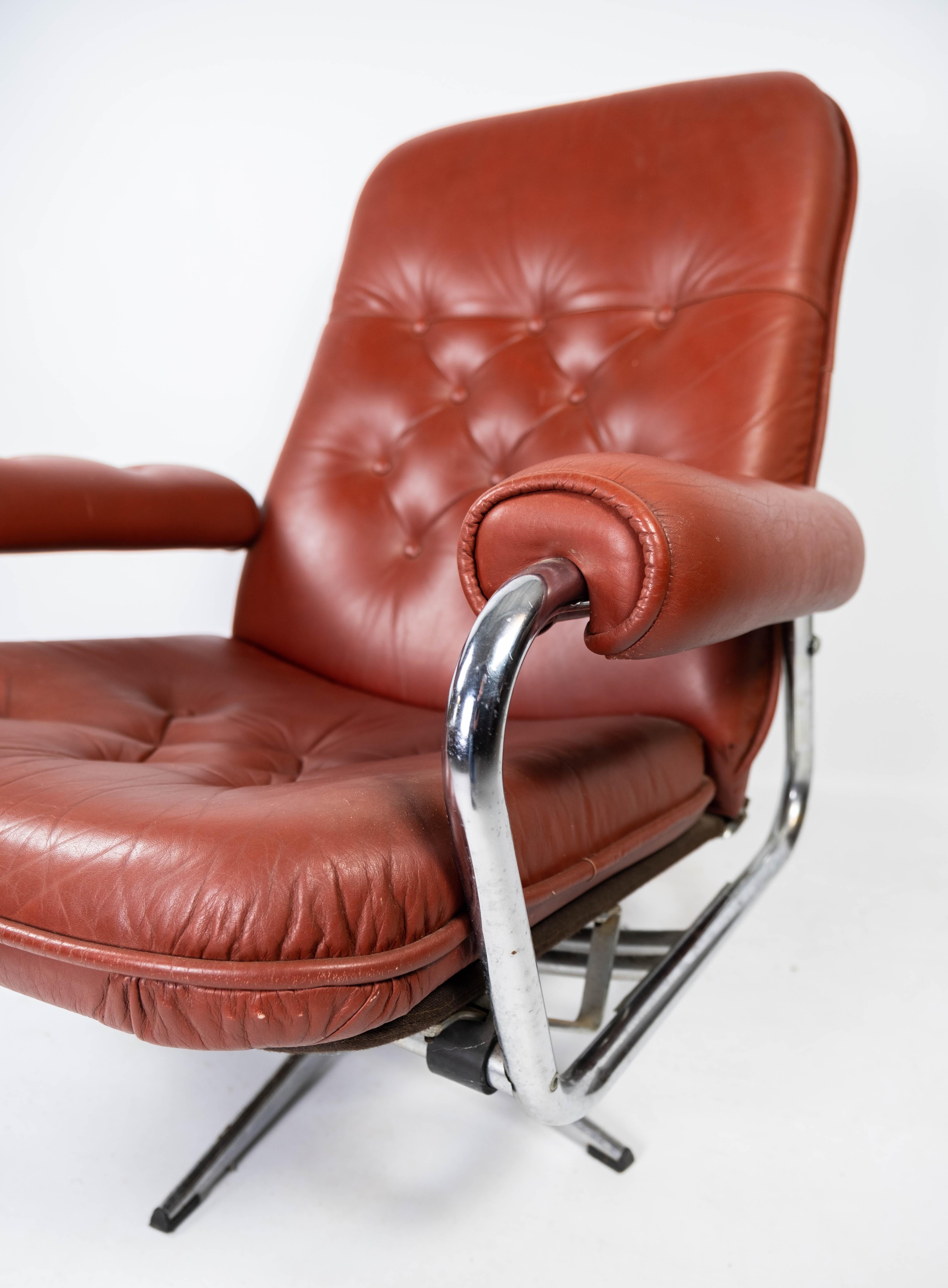 Mid-20th Century Armchair Upholstered with Red Leather and Frame of Metal, of Danish Design, 1960 For Sale