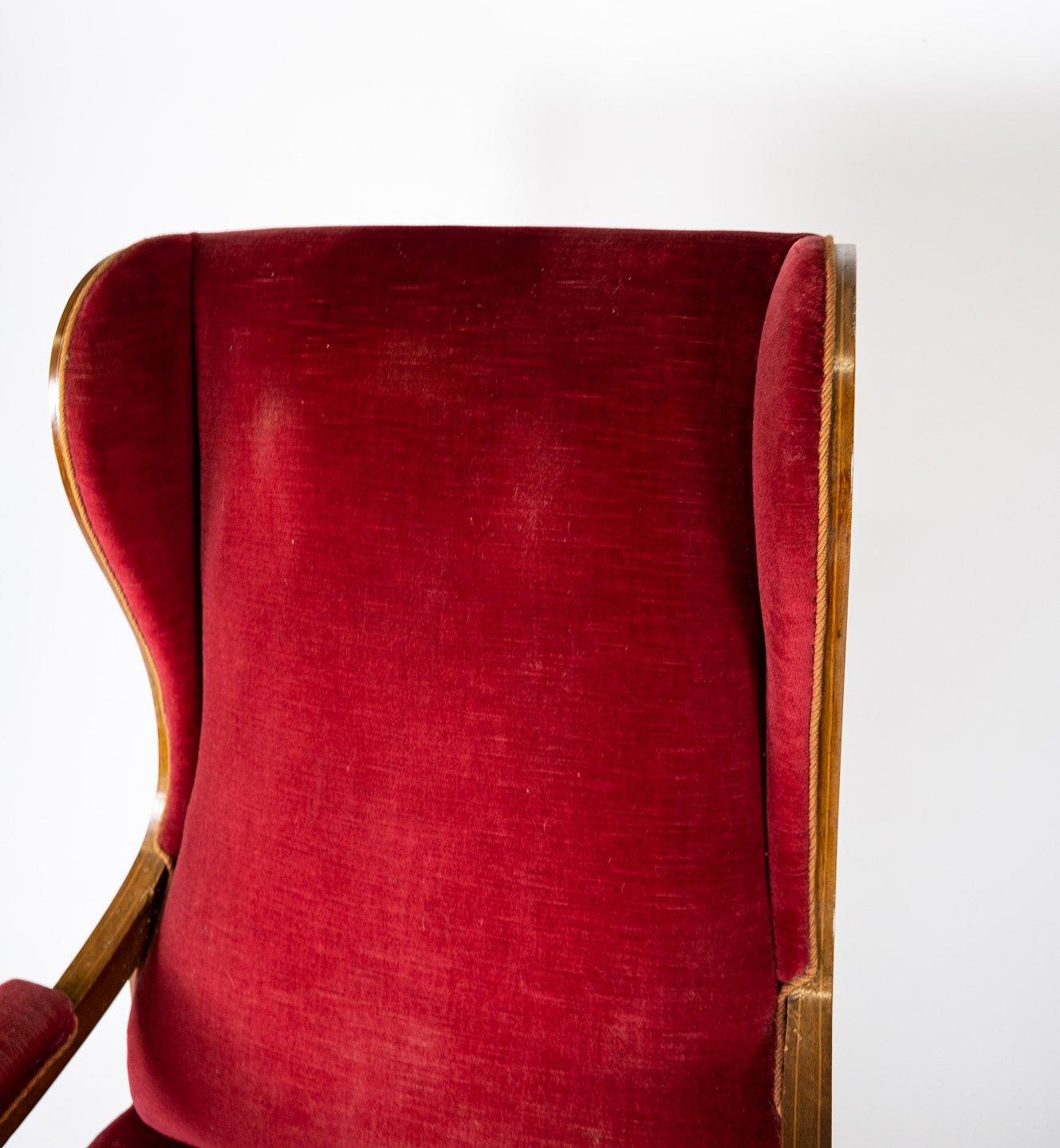 Scandinavian Modern Armchair Upholstered with Red Velvet and Mahogany Designed by Frits Henningsen For Sale