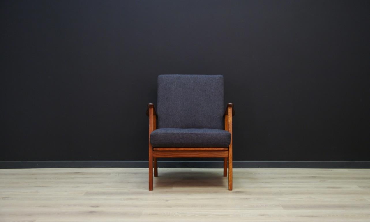 Fantastic armchair from the 1960s-1970s, minimalistic form, Danish design. New upholstery (gray color). Teak veneer armrests. Preserved in good condition (small bruises and scratches) - directly for use.

Dimensions: Height 78 cm width 67 cm depth