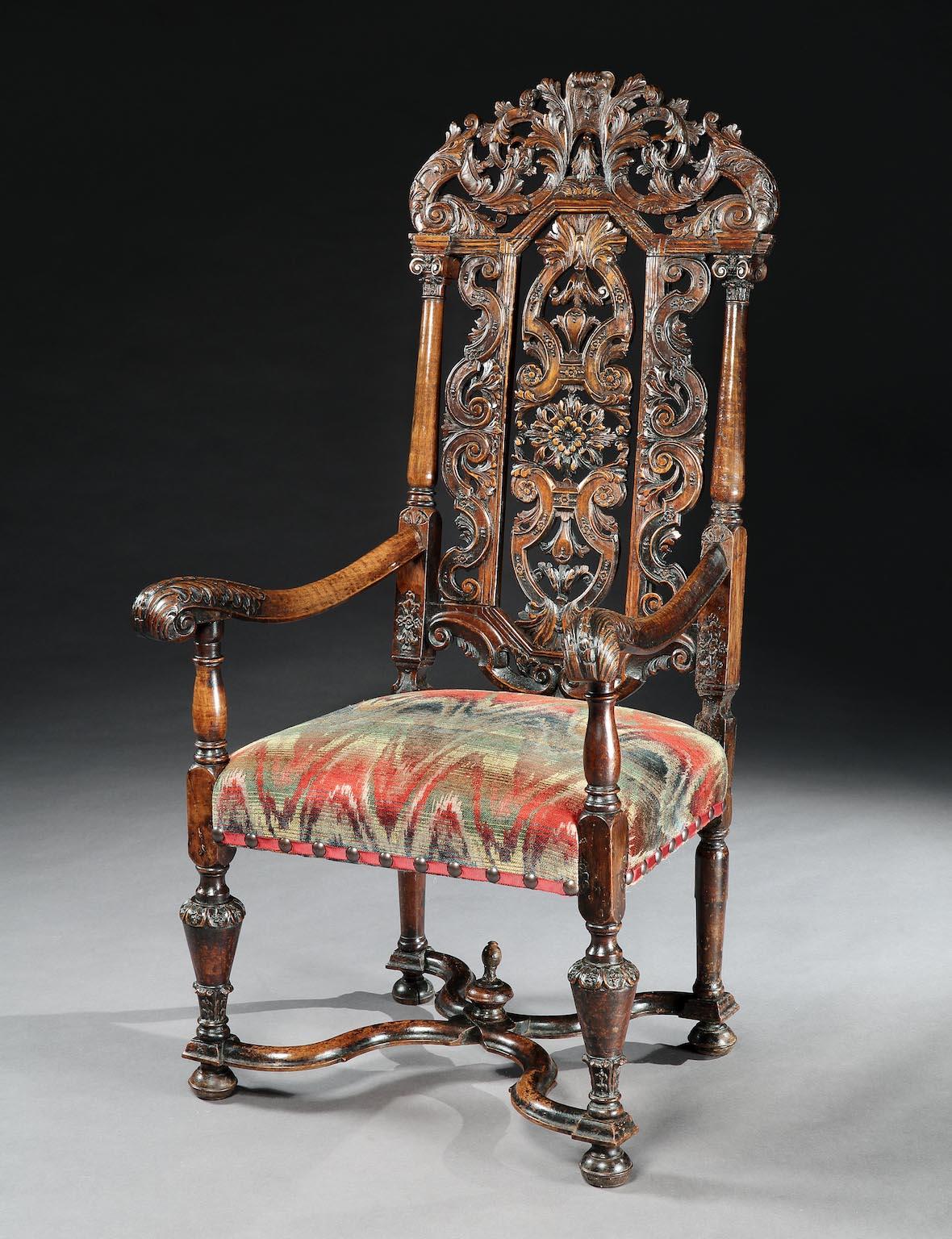 A fine, large, late 17th century, Flemish, open armchair in the style of Daniel Marot with an upholstered seat

This fine, armchair is an, unusually, large size and the carving is of exceptional quality reflecting the status of the owner it was made