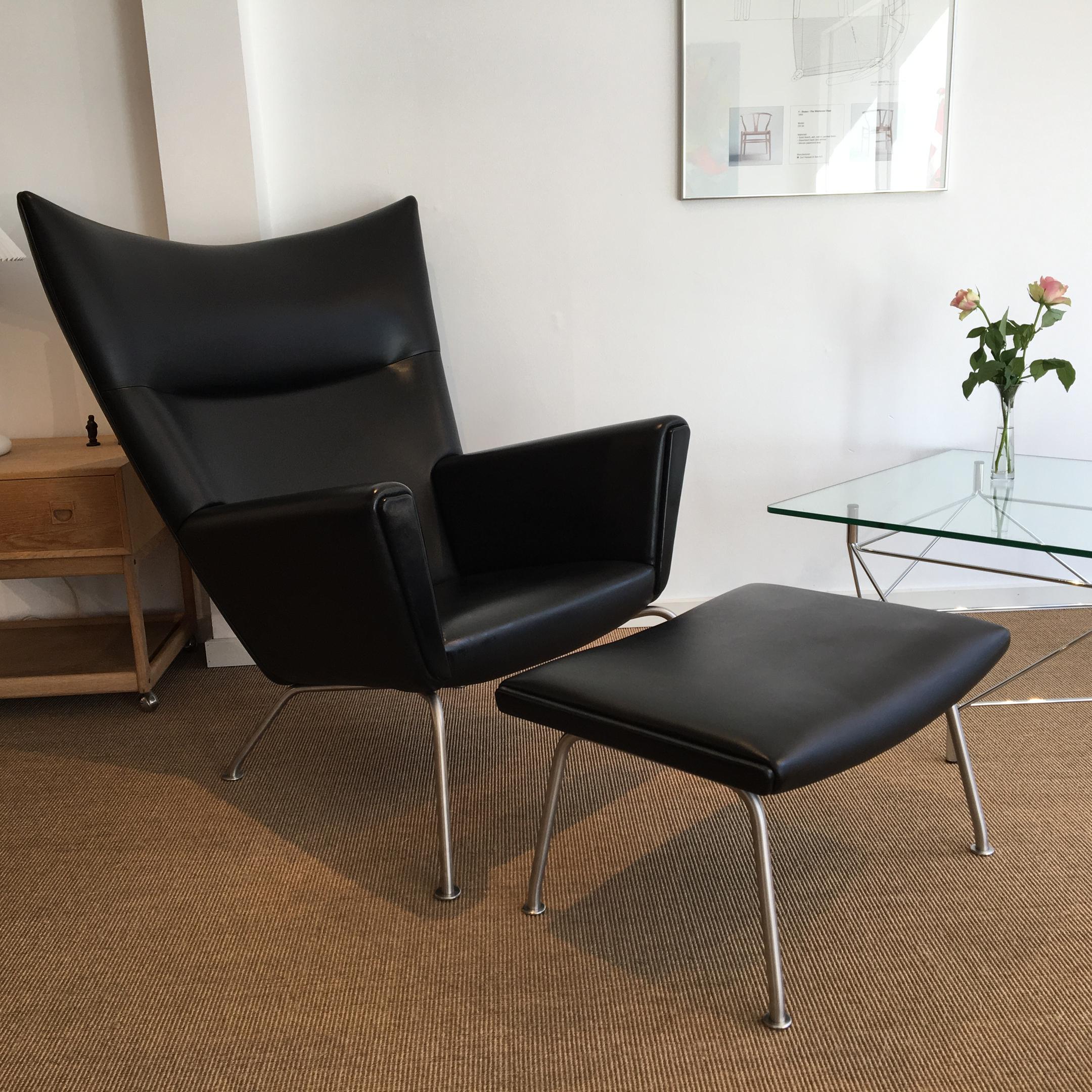 Stainless Steel Armchair 'Wing chair' with Stool in Leather, Design Hans J. Wegner