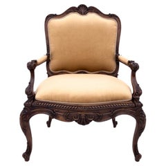Armchair with footstool, France, circa 1880. After renovation.