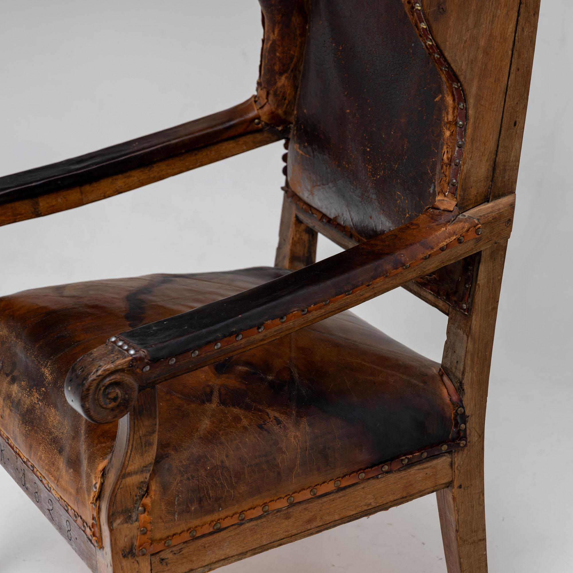 German Armchair with leather upholstery, dated 1828 For Sale