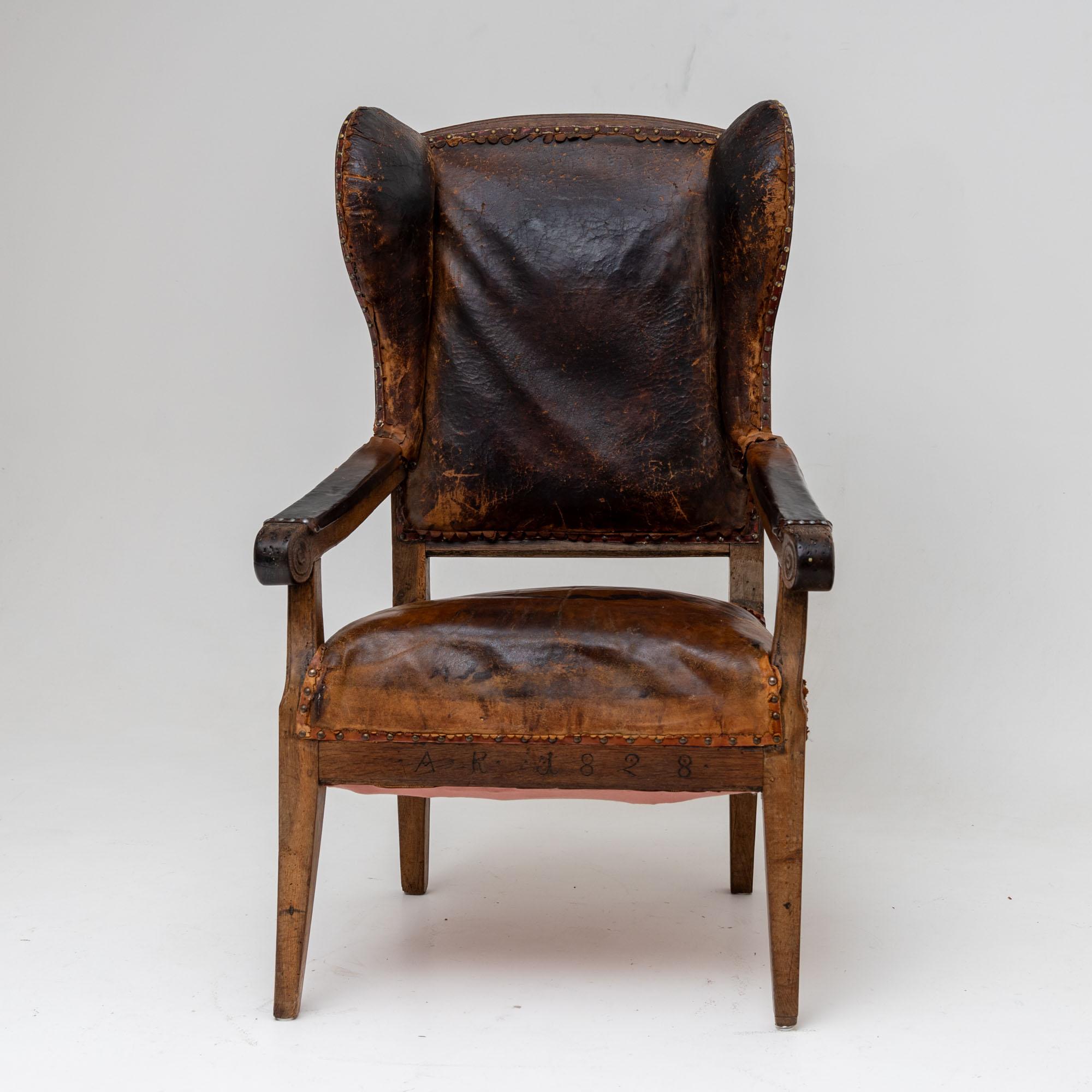 Leather Armchair with leather upholstery, dated 1828 For Sale