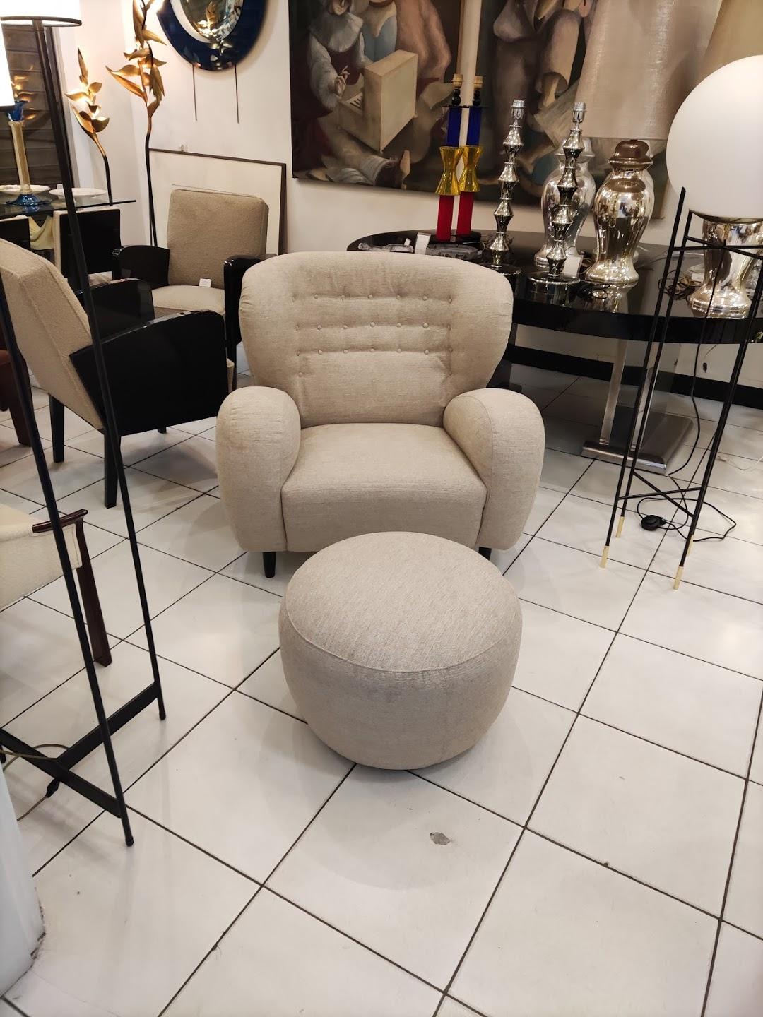 beige armchair with ottoman