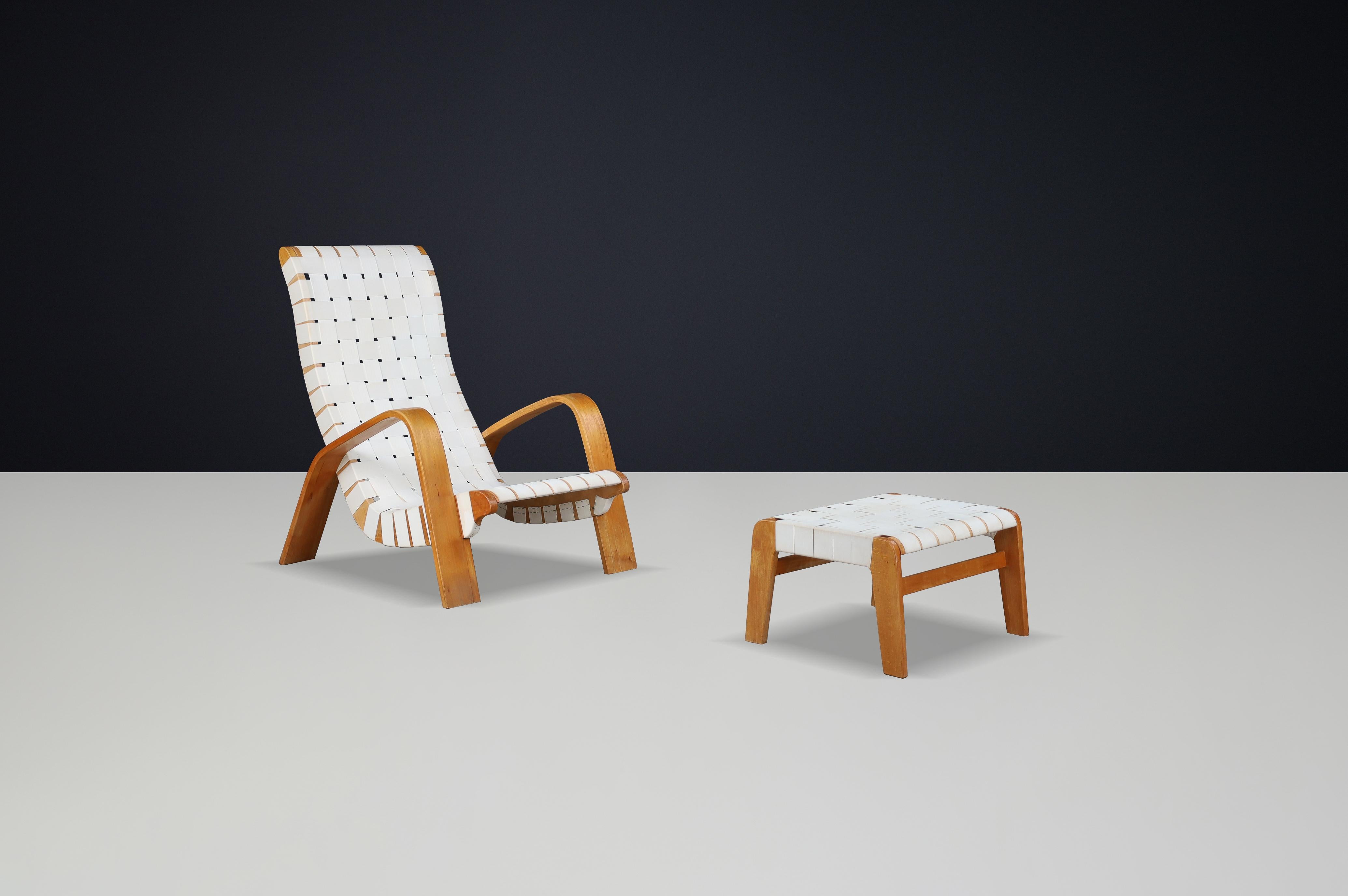 Mid-Century moderno Poltrona con ottomana in legno di bengala e fettuccia di tela, Repubblica Ceca, anni '30 in vendita