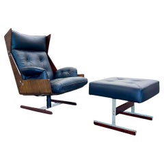 Sillón con otomana de palisandro, cuero y metal, JD Moveis, años 60