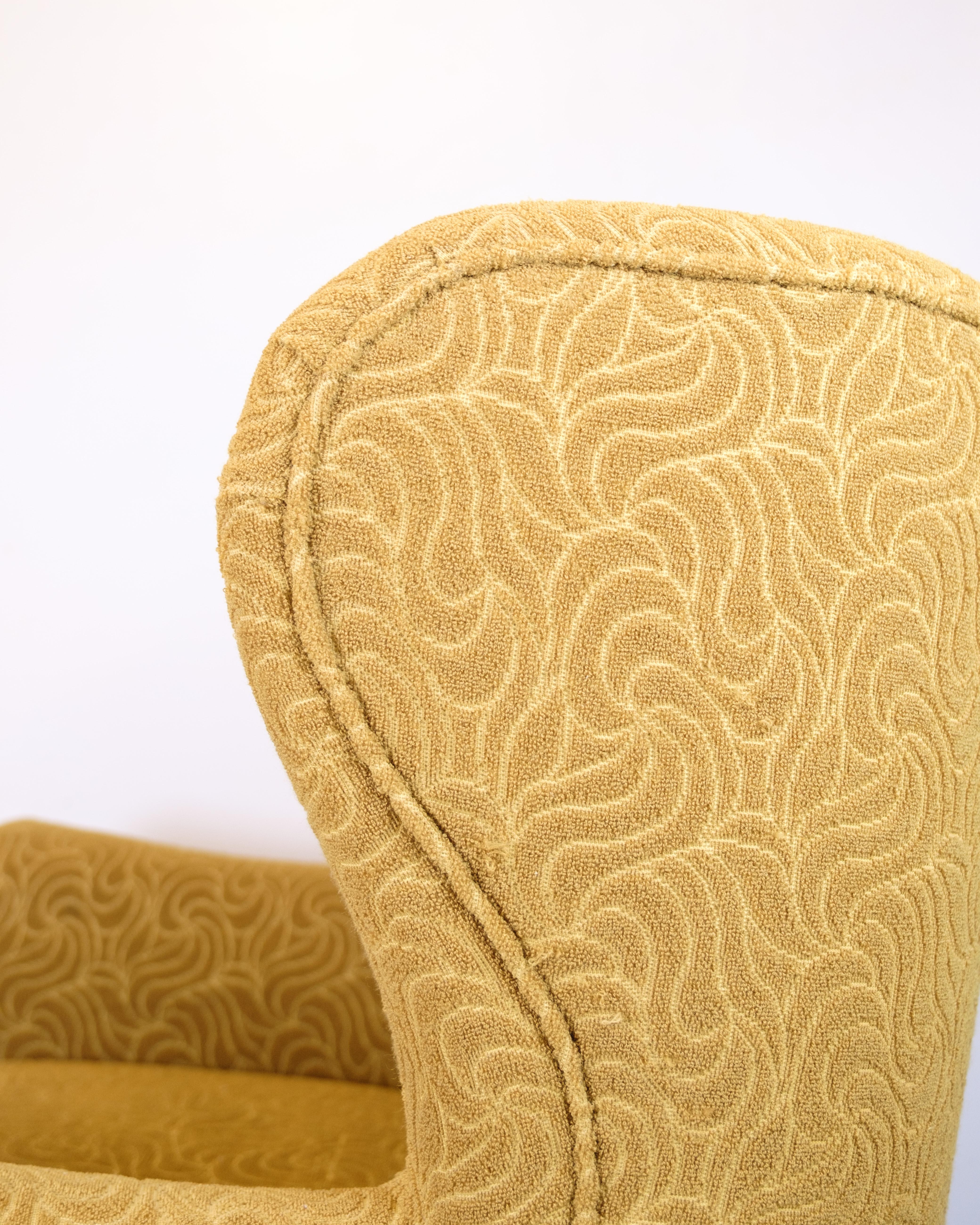 Mid-20th Century Armchair With Ottoman, Patterned Yellow Fabric With Black Legs From 1940s For Sale