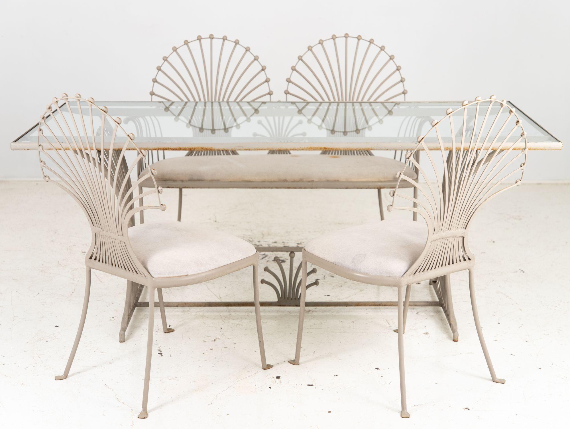 Elevate your dining experience with this exquisite armchair adorned with a stunning Peacock or wheat sheaf motif, crafted in gray painted aluminum for a contemporary touch. Inspired by Leinfelder wheat sheaf garden table. A set is available,