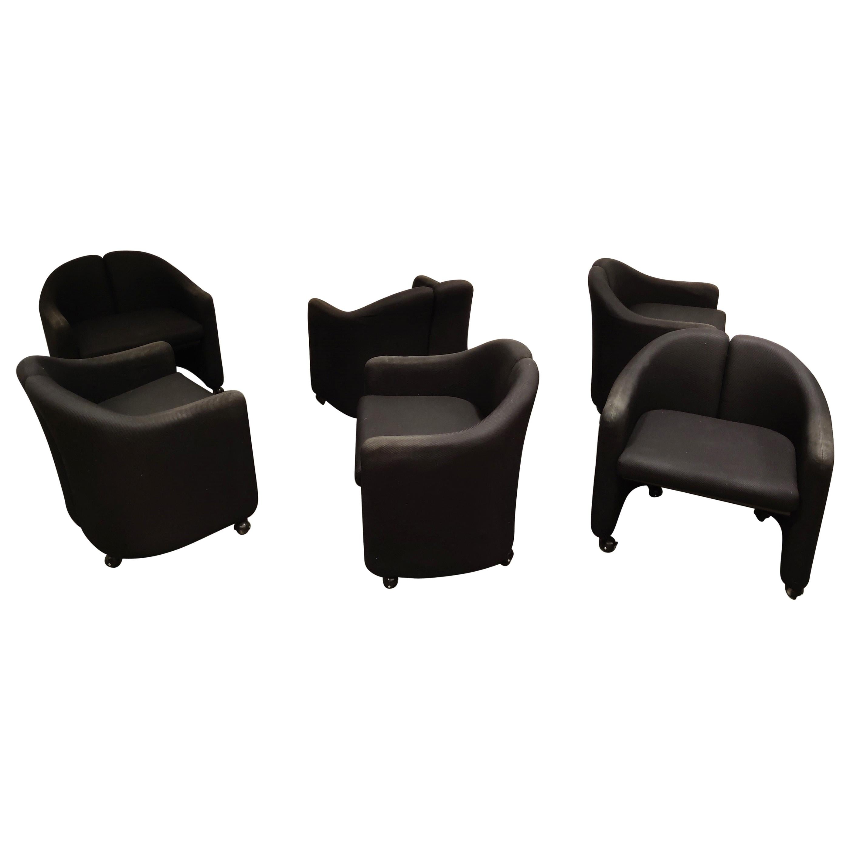 Black fabric armchairs designed by Eugenio Gerlio for Tecno, Italy.

These beautiful 'split back' armchairs sit very comfortable.

Good overall condition with minor wear on the armrests.

Labeled.

1980s, Italy

Dimensions:
Height 27 in.