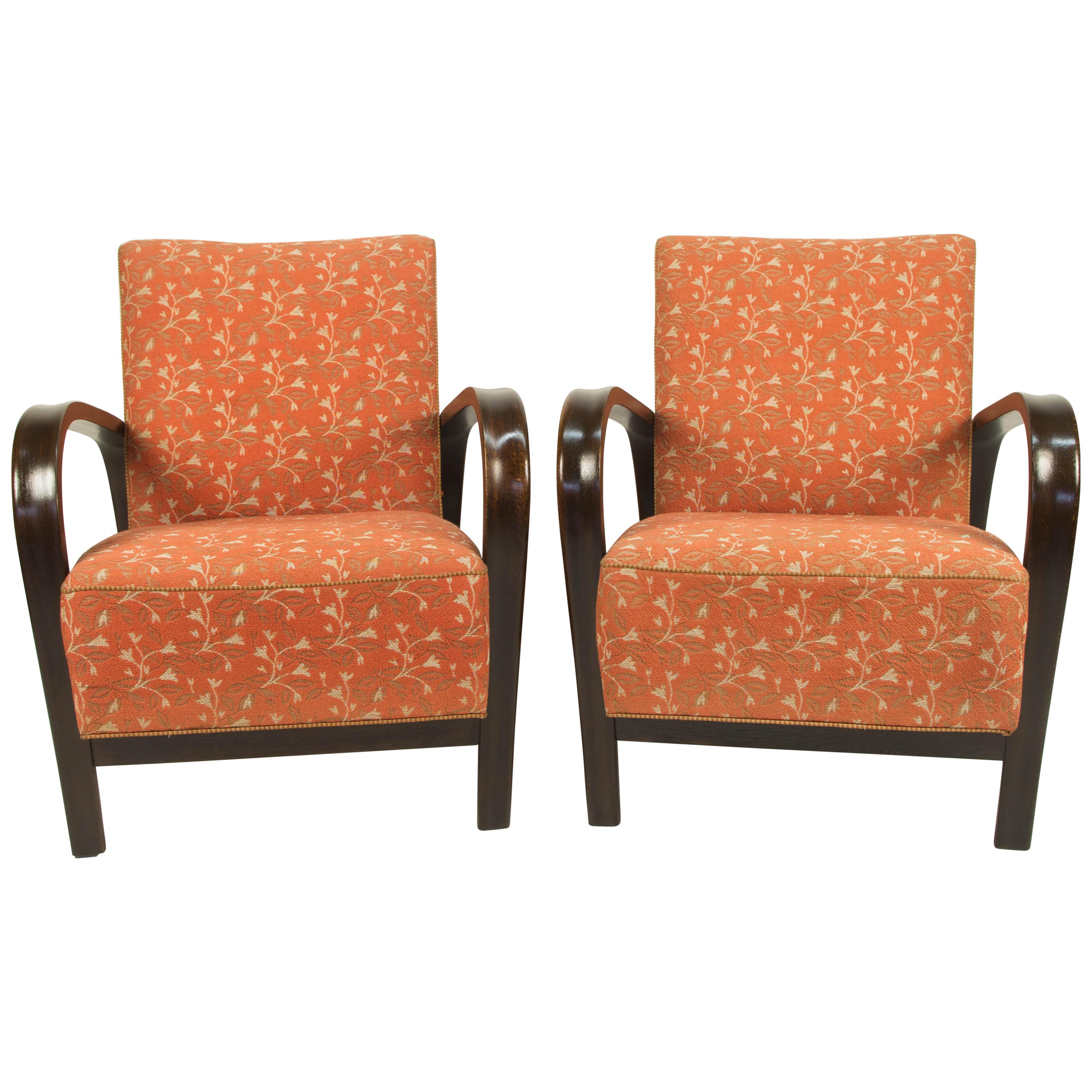 Hardly to find so extremely preserved set of two armchairs by famous Czech designers Karel Kozelka and Antonin Kropacek. Original upholstery with flowered pattern in excellent condition was professionally cleaned. Wooden parts with beautiful patina