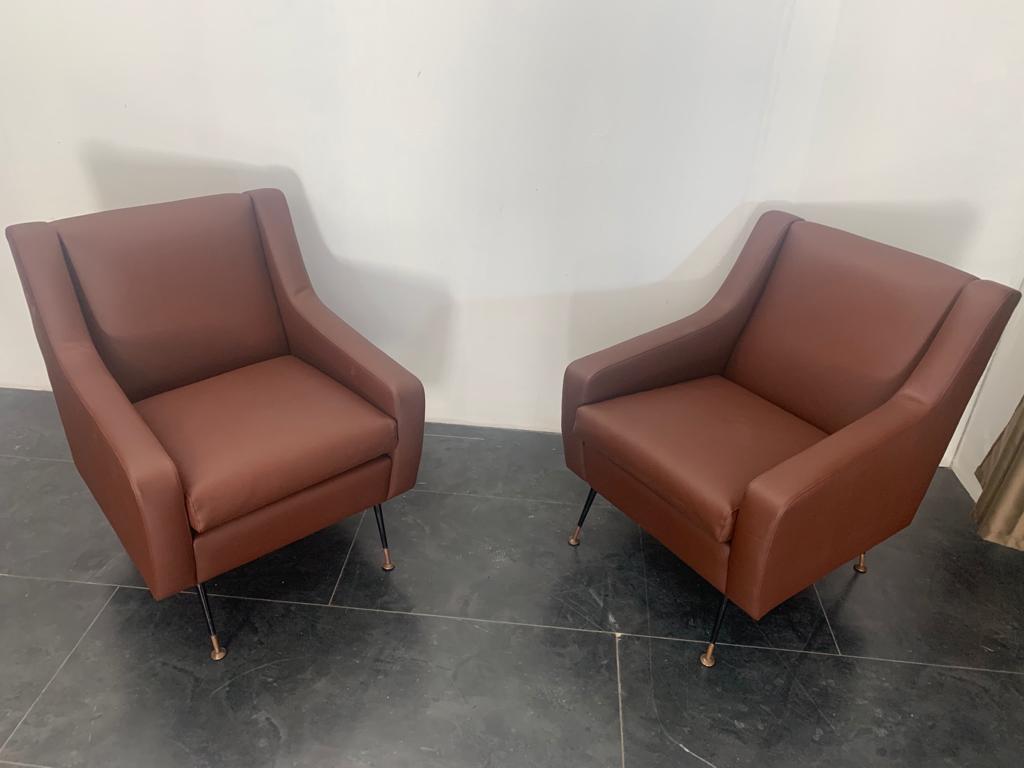 Armchairs in Leatherette, Italy, 1950s, Set of 2

Packaging with bubble wrap and cardboard boxes is included. If the wooden packaging is needed (crates or boxes) for US and International Shipping, it's required a separate cost (will be quoted