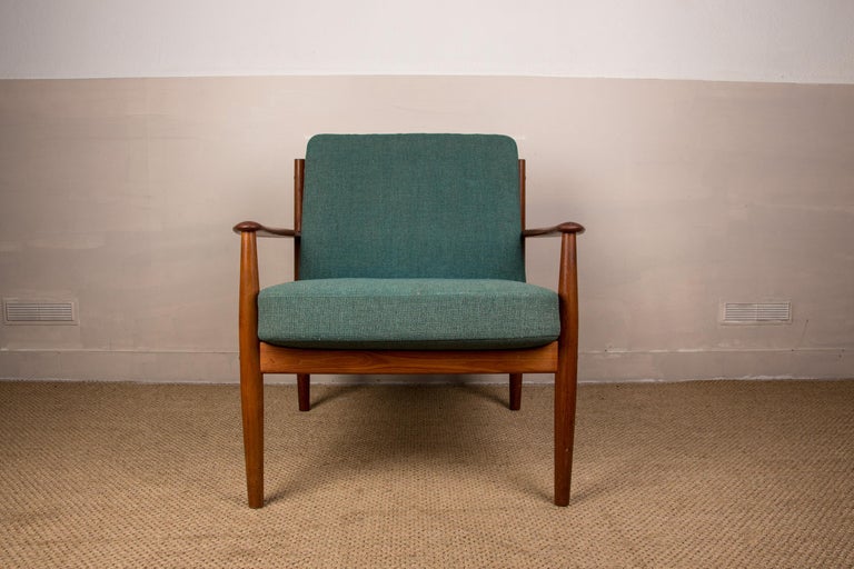 Designed in 1963, these armchairs bear the signature of Grete Jalk. Sober design, refined curves, they are particularly comfortable and elegant. The seats and backs are in beautiful original Kvadrat fabric. Furniture listed on the Design Museum