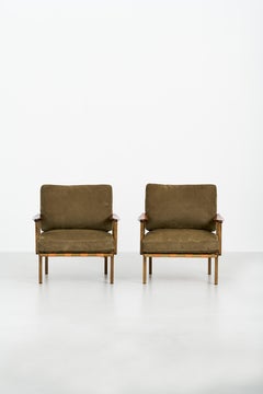 1961 Osvaldo Borsani-Armchairs with armrests mod. P24 green upholstery