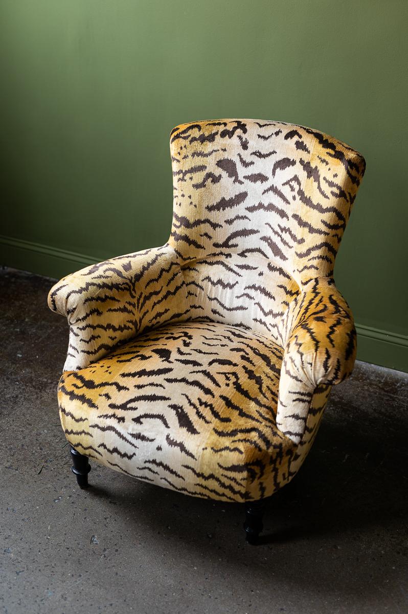 Newly reupholstered in Le Scalamandre Le Tigre fabric.