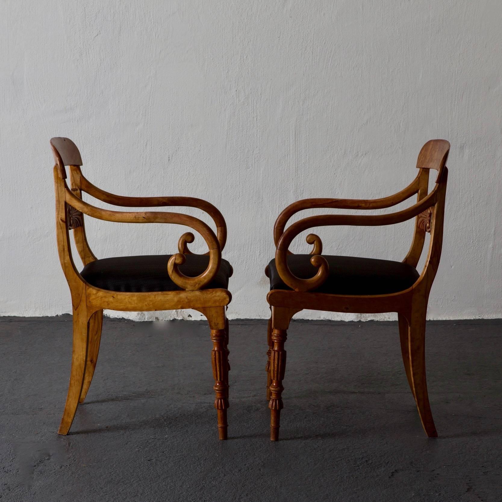 Armchairs Swedish Biedermeier 19th Century Birch Gilded Details, Sweden. A pair of armchairs made during the 19th century in Sweden. Made in light birch with gilded details. Upholstered with horsehair fabric.