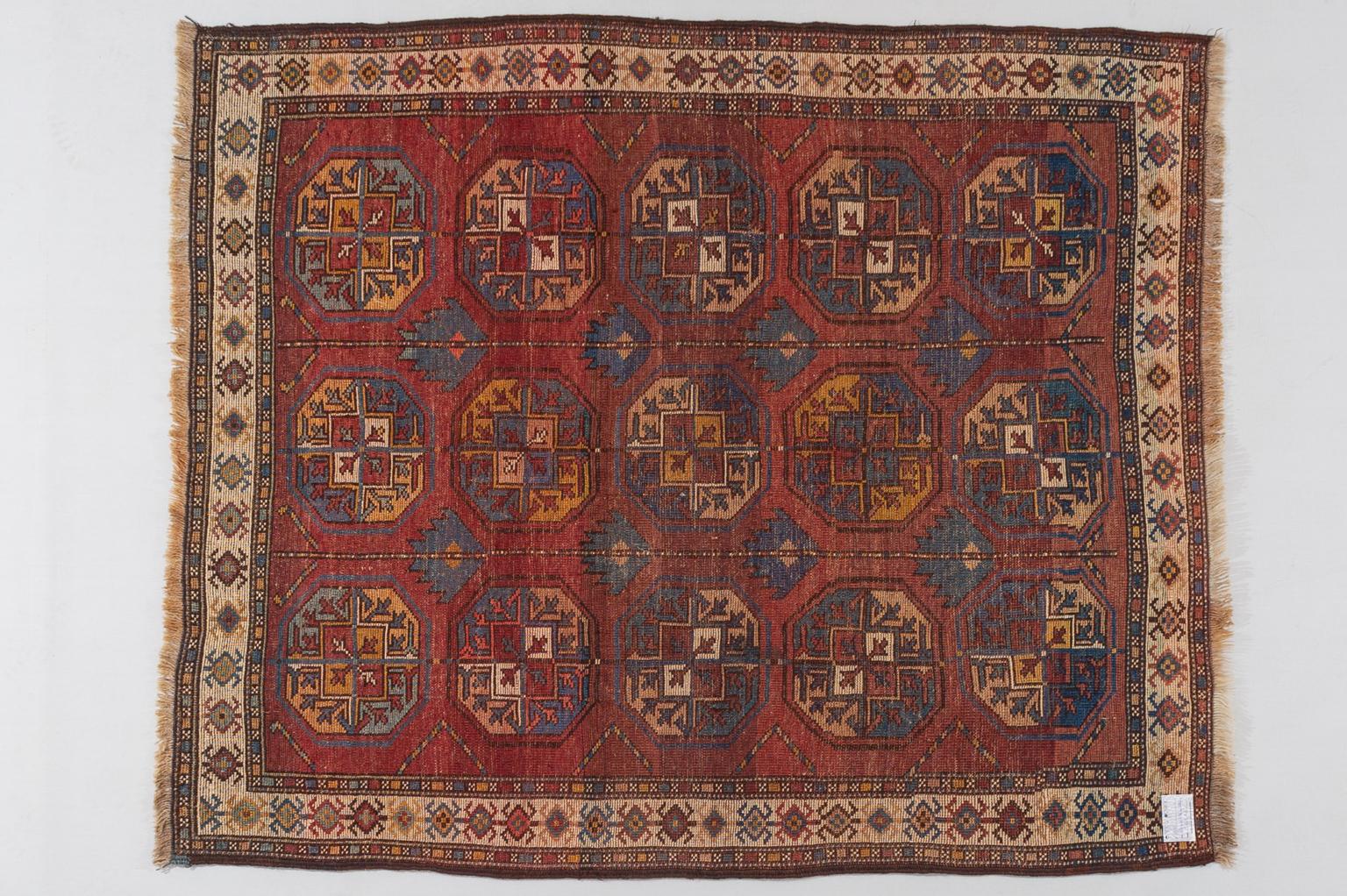 Unusual Armenian carpet in Bokara design with bright blue details.
The unusual size and the very soft wool make it ideal resting on a sofa or even on the bed!  However, it is always a soft carpet...
