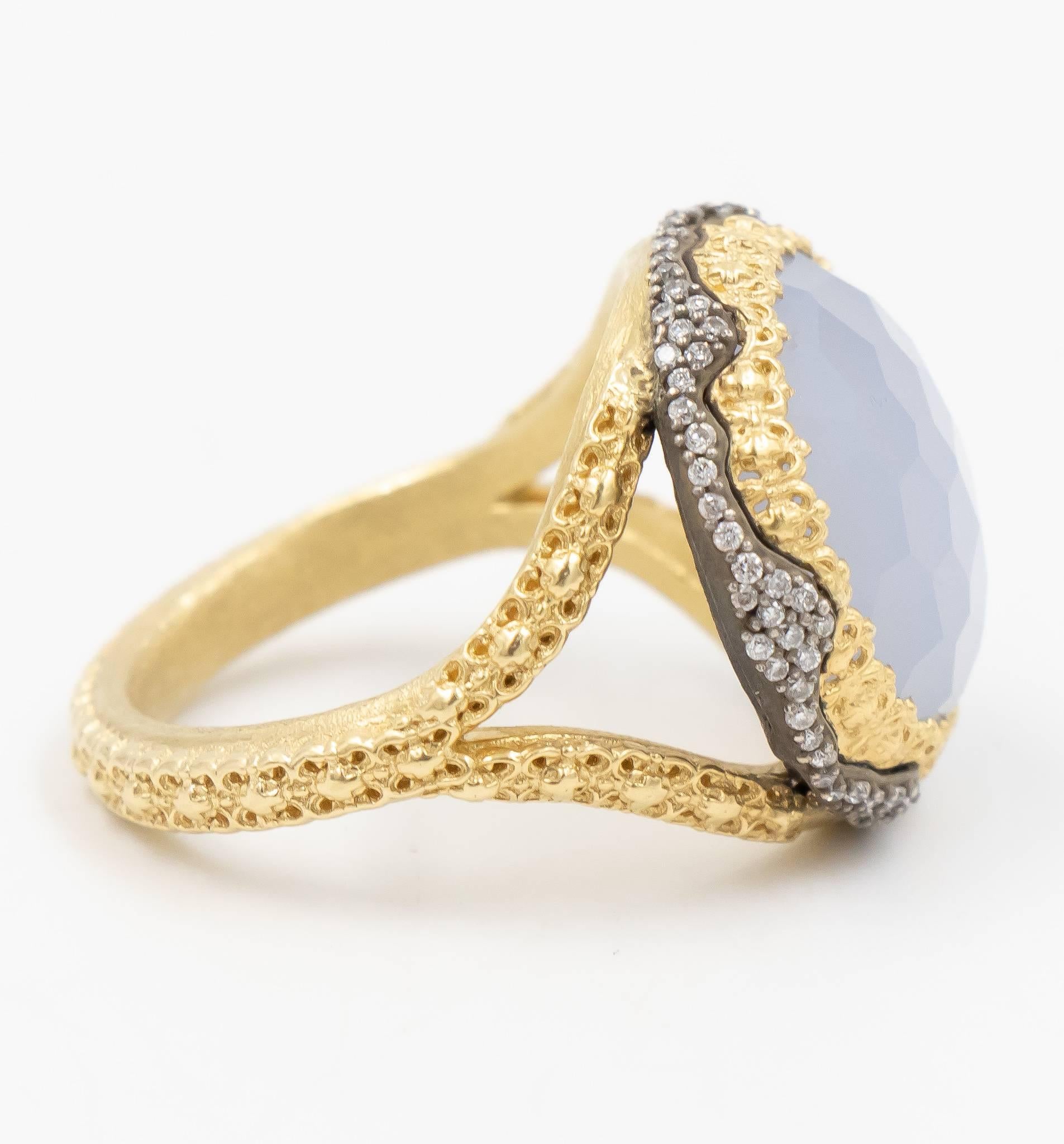 This Armenta ring is from the Old World collection and features an 18 karat yellow gold band mixed with the Armenta's signature 