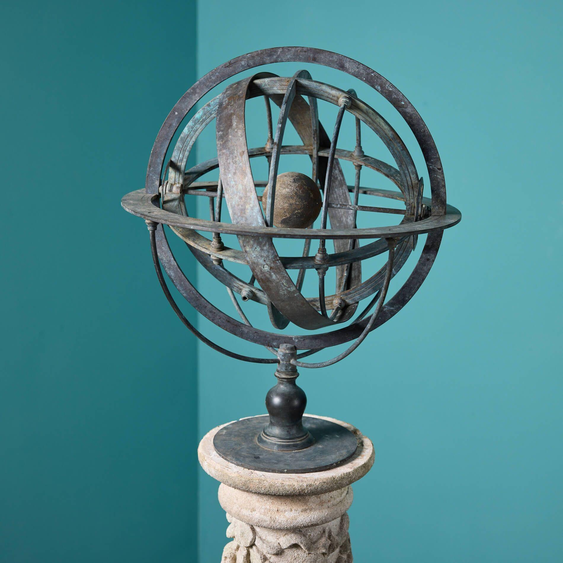 Cast in bronze, this armillary sundial sits upon a limestone pedestal in the neoclassical style. It is a beautiful addition to a country garden where it might be situated among flowerbeds or at the centre of a large courtyard. As opposed to the
