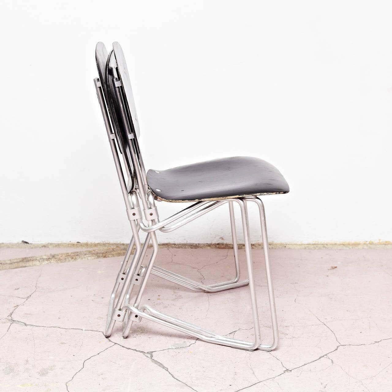 Stackable Aluflex chairs designed by Armin Wirth
Manufactured by Aluflex, Switzerland, circa 1950. 

In good original condition, with minor wear consistent with age and use, preserving a beautiful patina.

2 Chairs available.