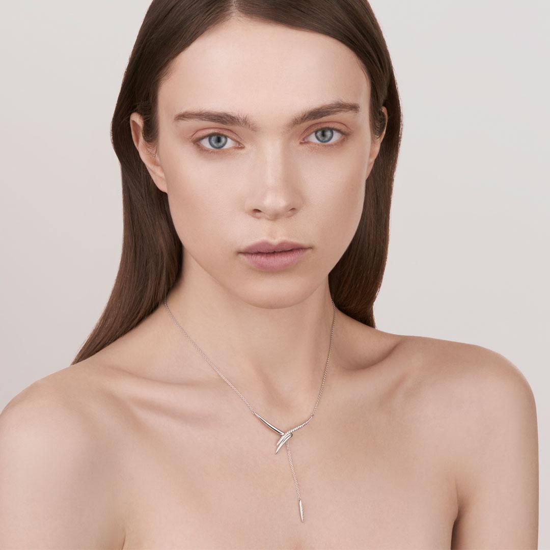 Armis Drop Necklace is crafted from 18ct white gold and 0.35cts of brilliant white diamonds - a perfect parure when paired with our Armis Drop Bracelet.  A silhouette of interlocking curves, frame the décolletage in a sweep of precision-set pavé