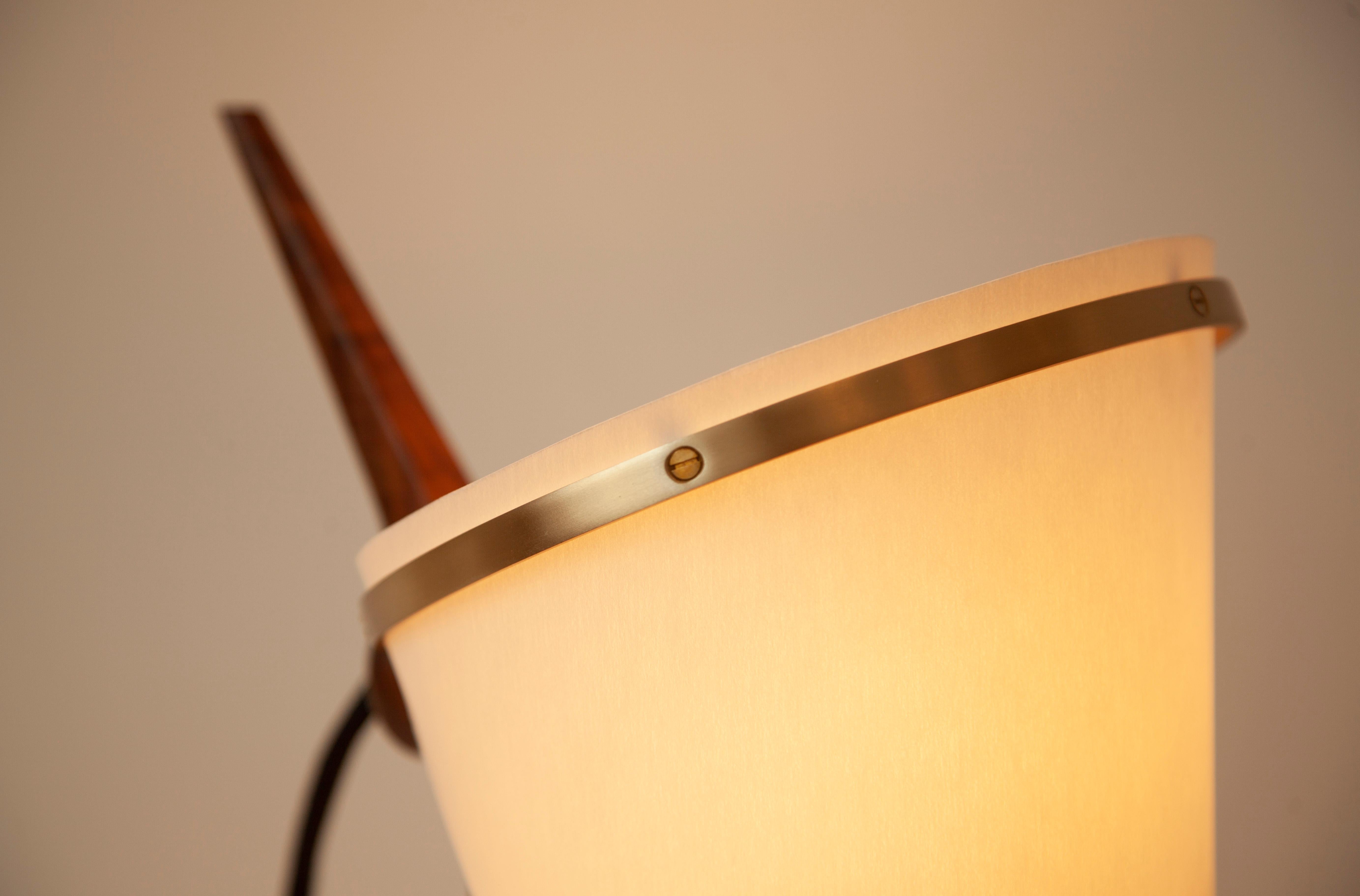 The Armitage Accent Lamp differs slightly from the rest of the Armitage Lamp Collection given it's solid brass structure, though shares the same characteristics with its black walnut tail detail and of course it's shade sourced from recycled water