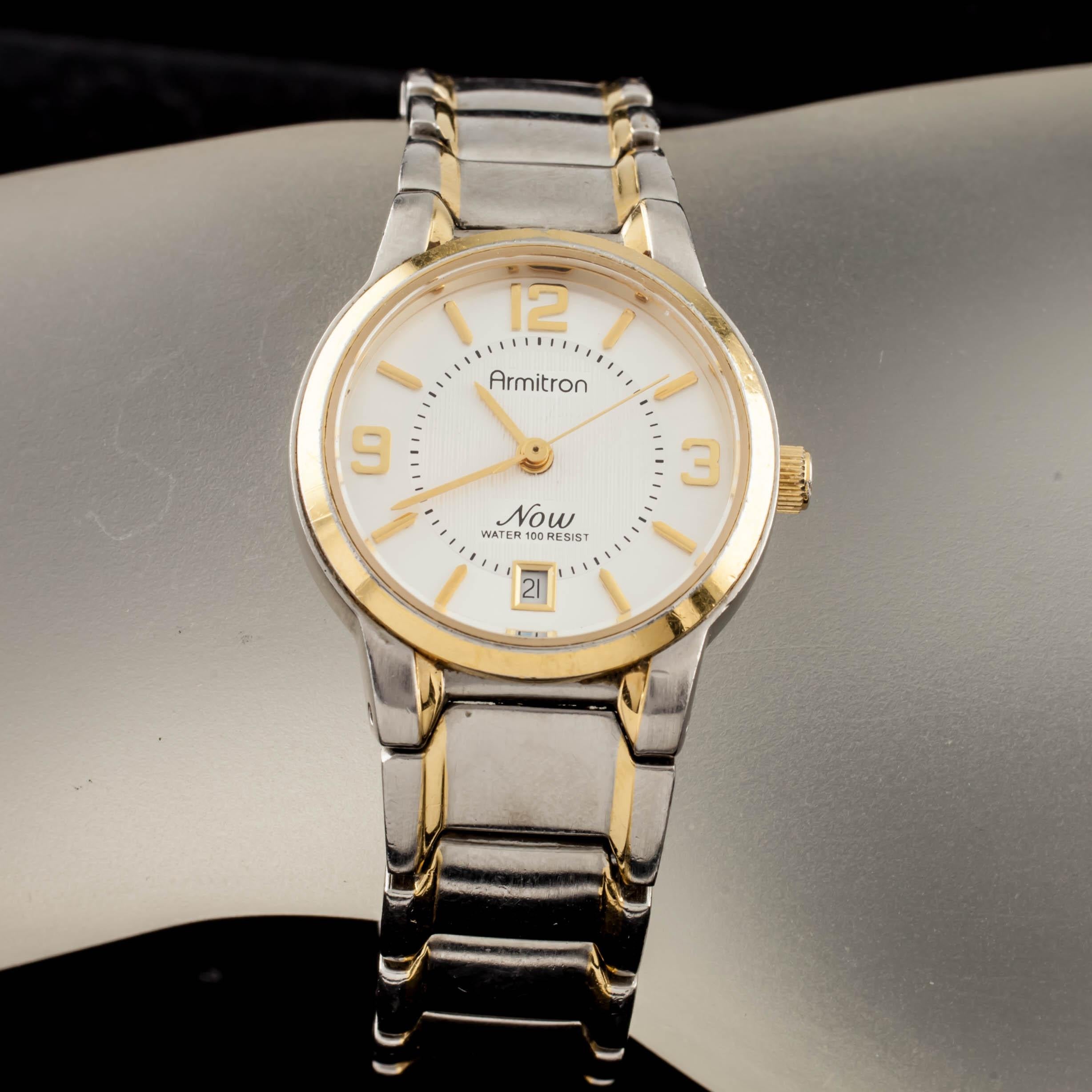 Quartz movement #775.
Case #75/3281.
Weight: 60.3 grams.
Does not include original box or papers.
This watch is guaranteed authentic. One year warranty included with purchase.

Stainless steel case with gold-plated bezel.
Diameter: 25