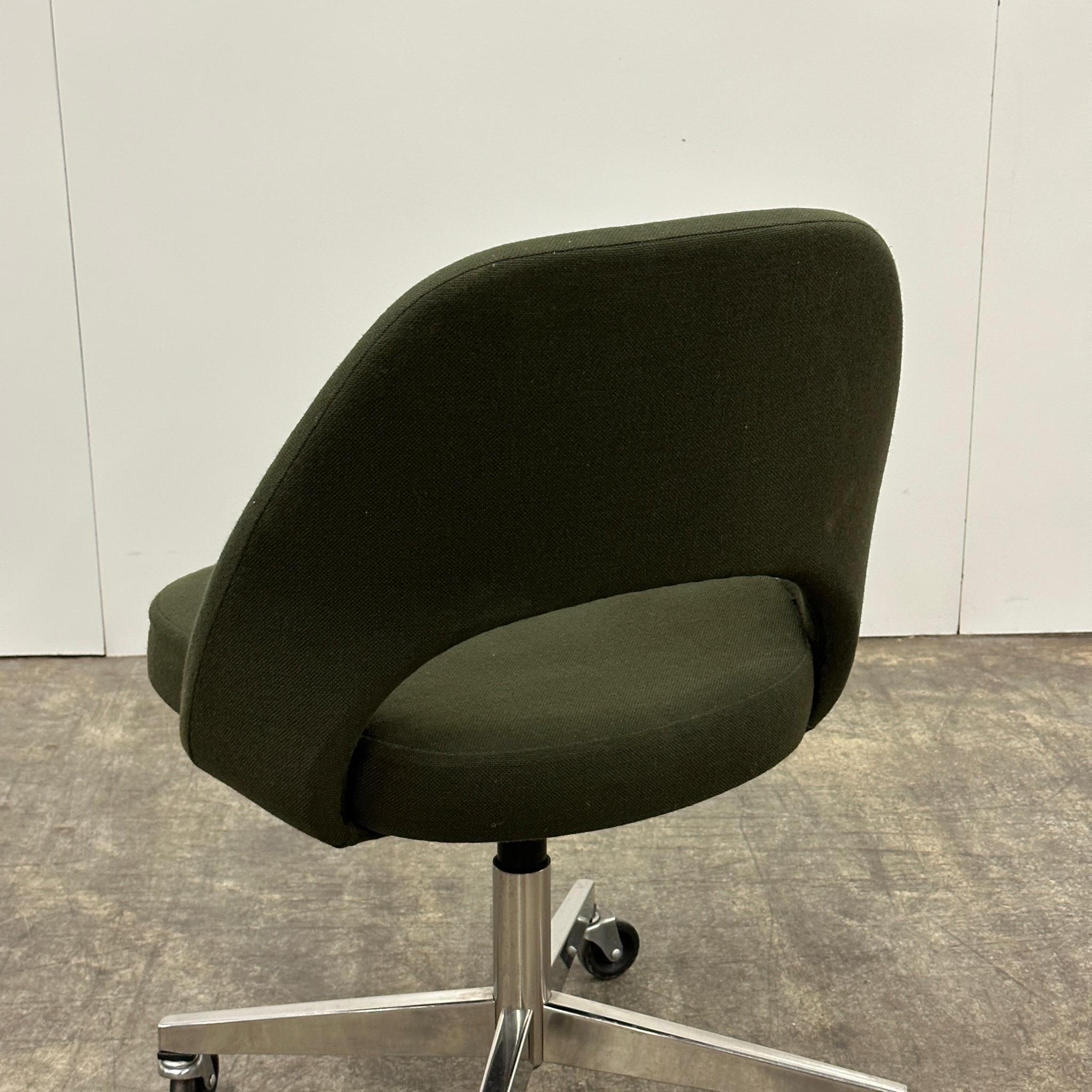 c. 1983. Upholstered in dark green wool. On vaster, height adjustable and swivels. 