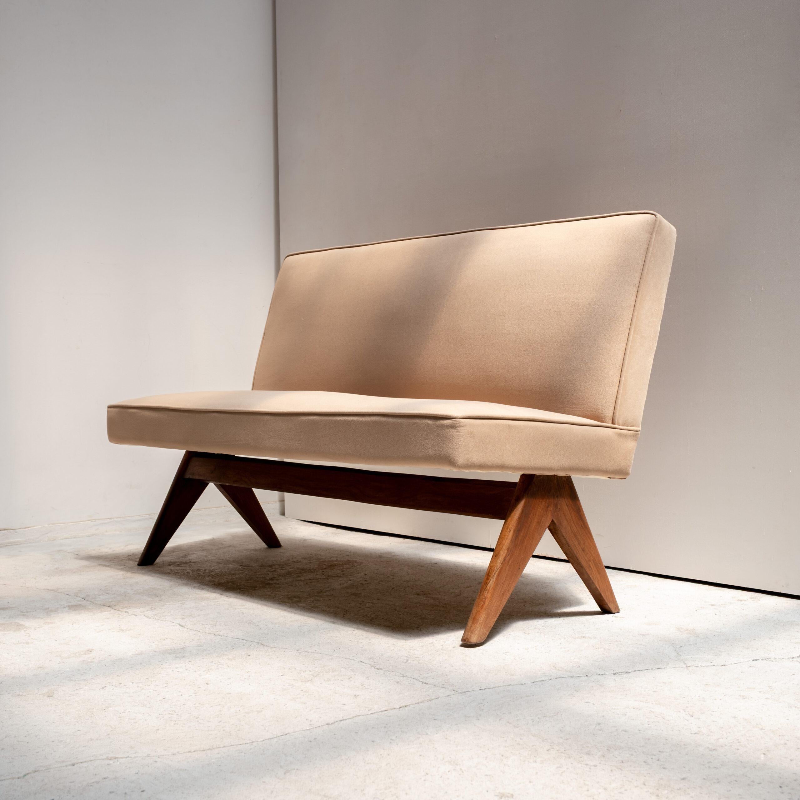 A rare and authentic example from the Chandigarh project in India, this teak armless sofa by Pierre Jeanneret reflects the architect’s rational yet sculptural design language. Characterized by its solid teak construction.

The design embodies