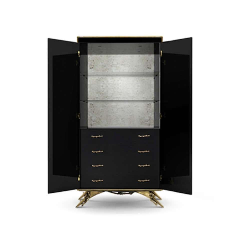 Armoire
Measures: Height 78.75 in. (200 cm)
Width 41.34 in. (105 cm)
Depth 23.63 in. (60 cm)
Gold leaf, lacque, brass, mirror
Estimated production time:13-14 weeks.

There is a sense of reveal and conceal  takes a beautiful armoire in high gloss