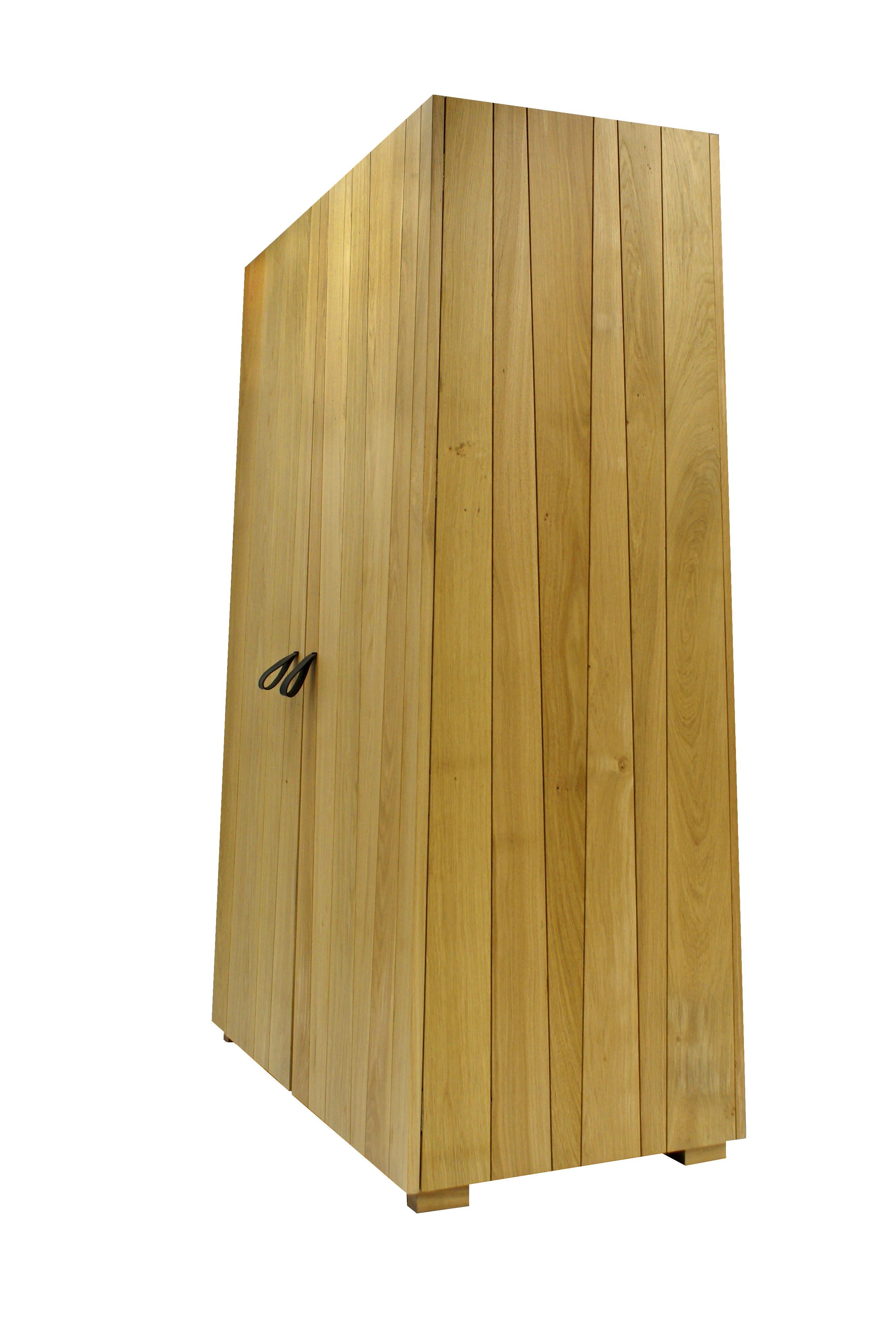 Armoire in solid natural oak by Eric Jourdan. 

Material: Solid natural oak from burgundy. Dimensions: Bottom dimensions: L 55