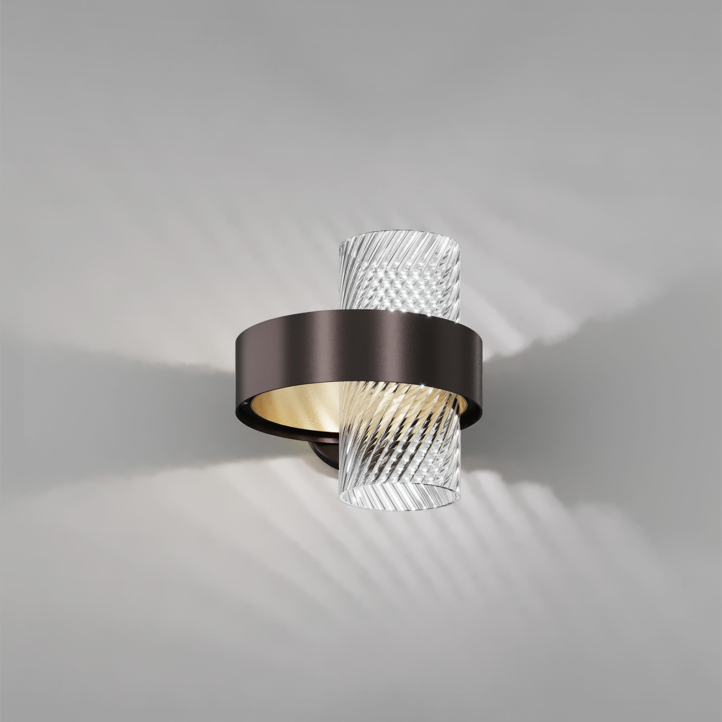 Armonia wall lamp in crystal glass with black and brass frame by Vistosi.