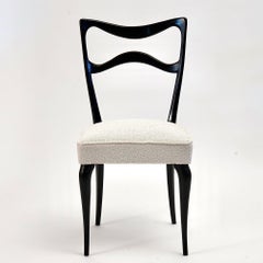 Silla de comedor Armonia de nogal, acabado ebonizado, diseño de Silvio Piattelli