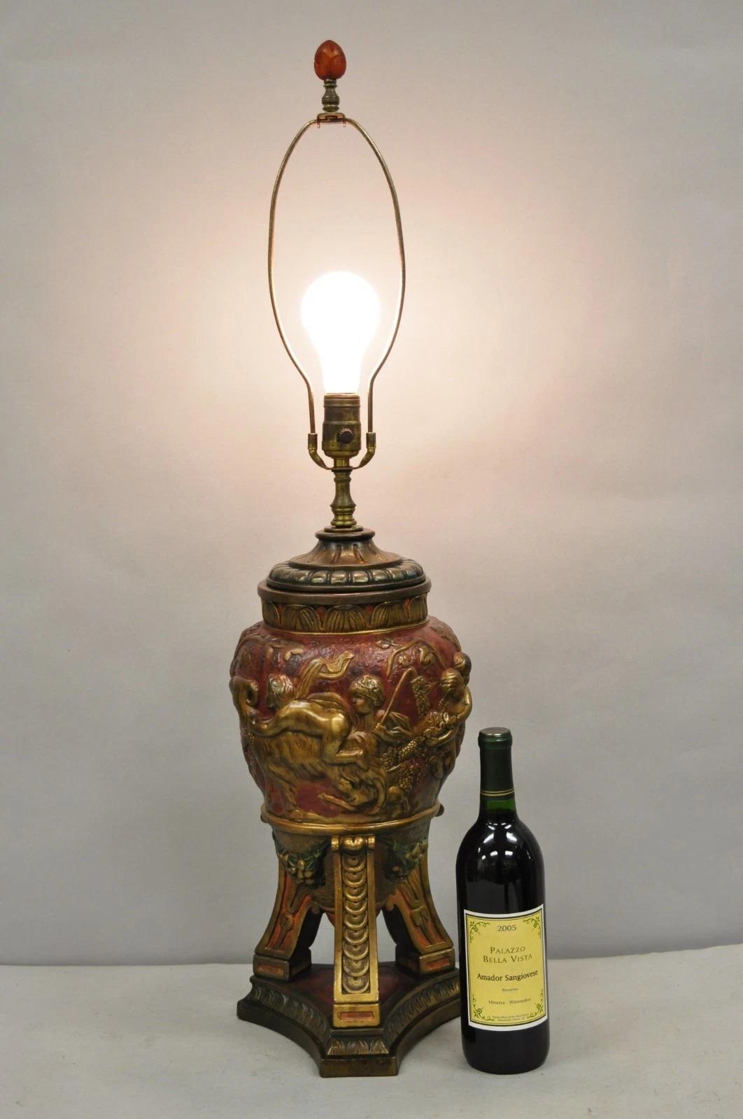 Vintage Italian Classical Figural Cherubs & Ram Polychrome Painted Bronze Clad Urn Form Table Lamp by Armor Bronze. Circa Early 20th Century. Dimensions : 35