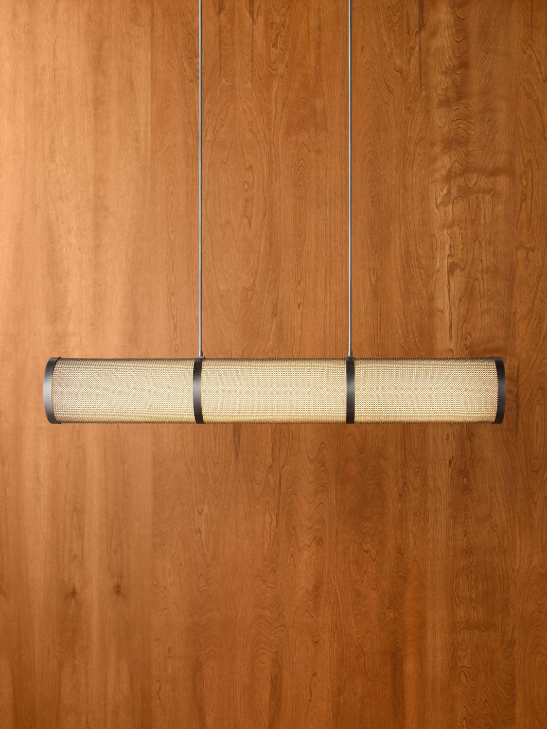 The Armor Linear features a linen shade cloaked with chainmail, creating a layered interplay of texture and diffused light.

Available in two sizes, Small (6.75