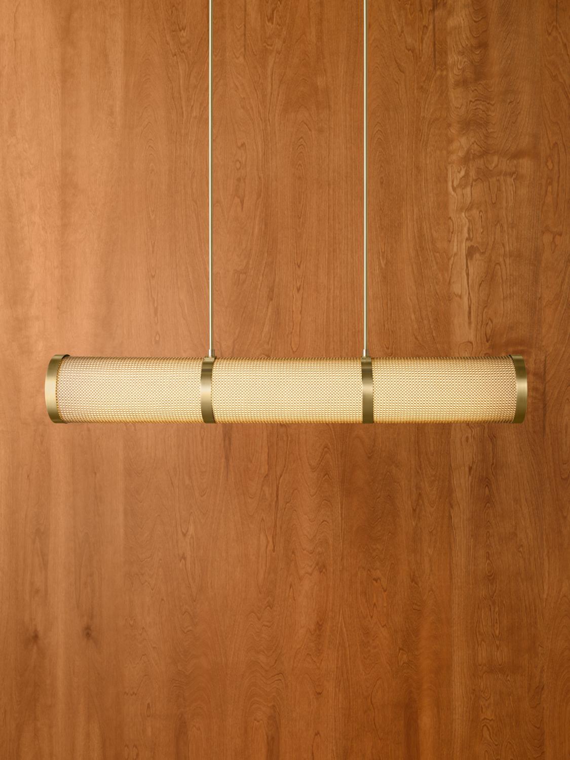 The Armor Linear features a linen shade cloaked with chainmail, creating a layered interplay of texture and diffused light.

Available in two sizes, Small (6.75